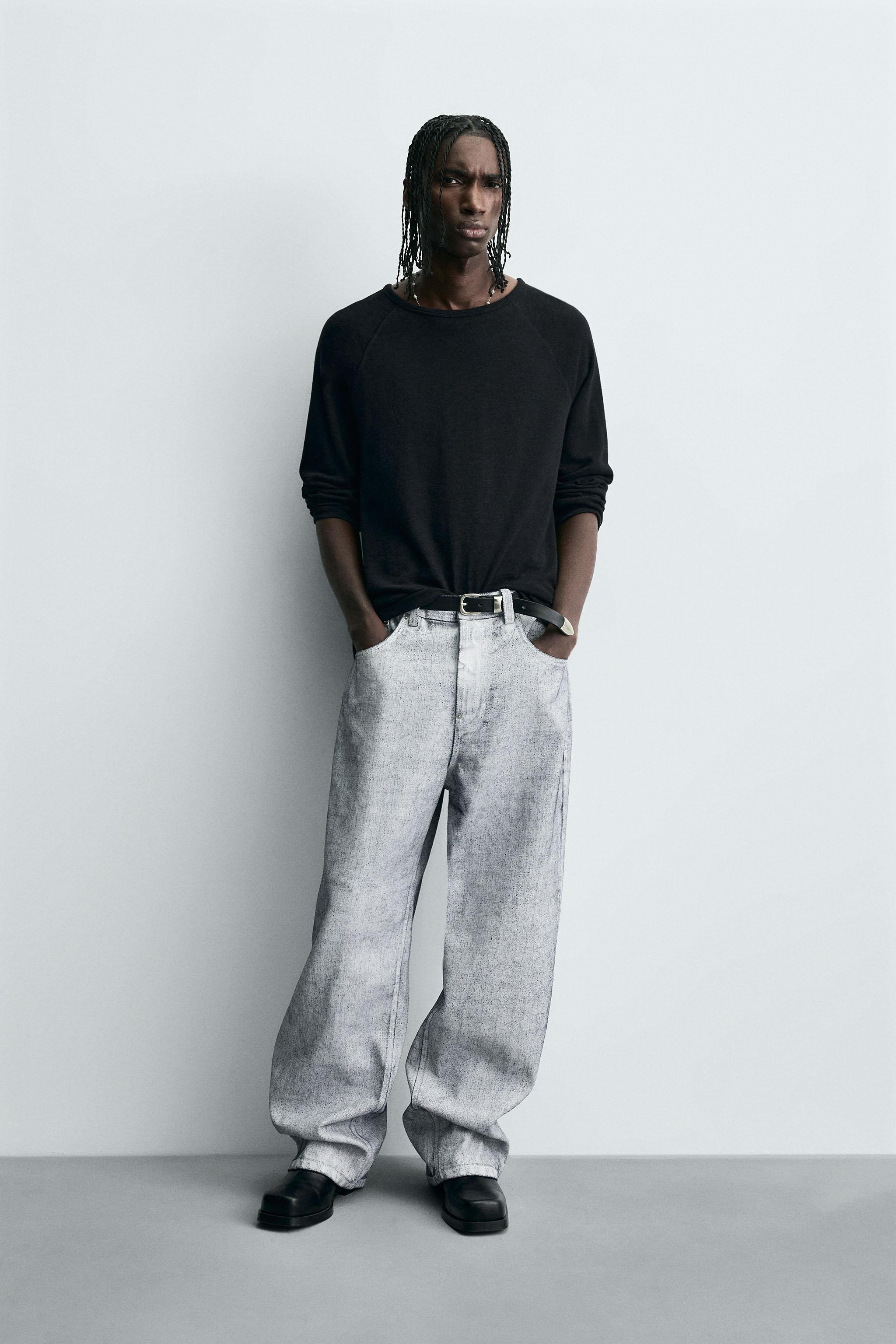 WAXED FINISH BAGGY FIT JEANS