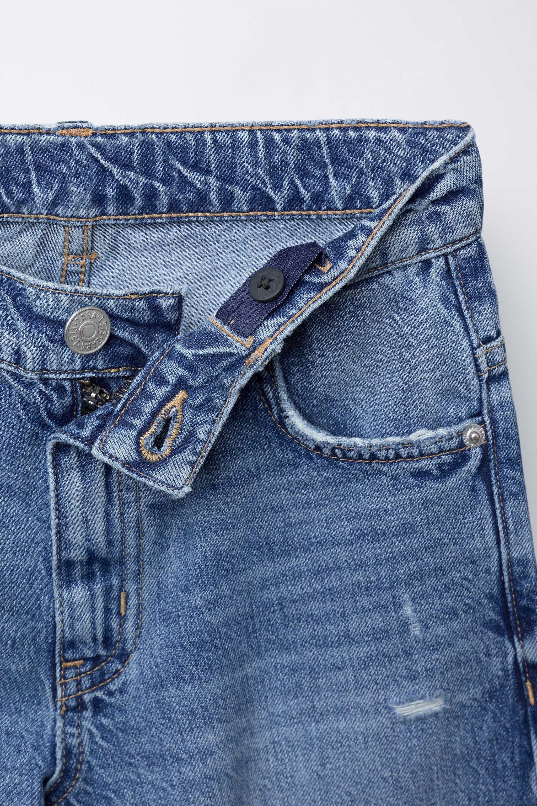 RIPPED WIDE LEG JEANS