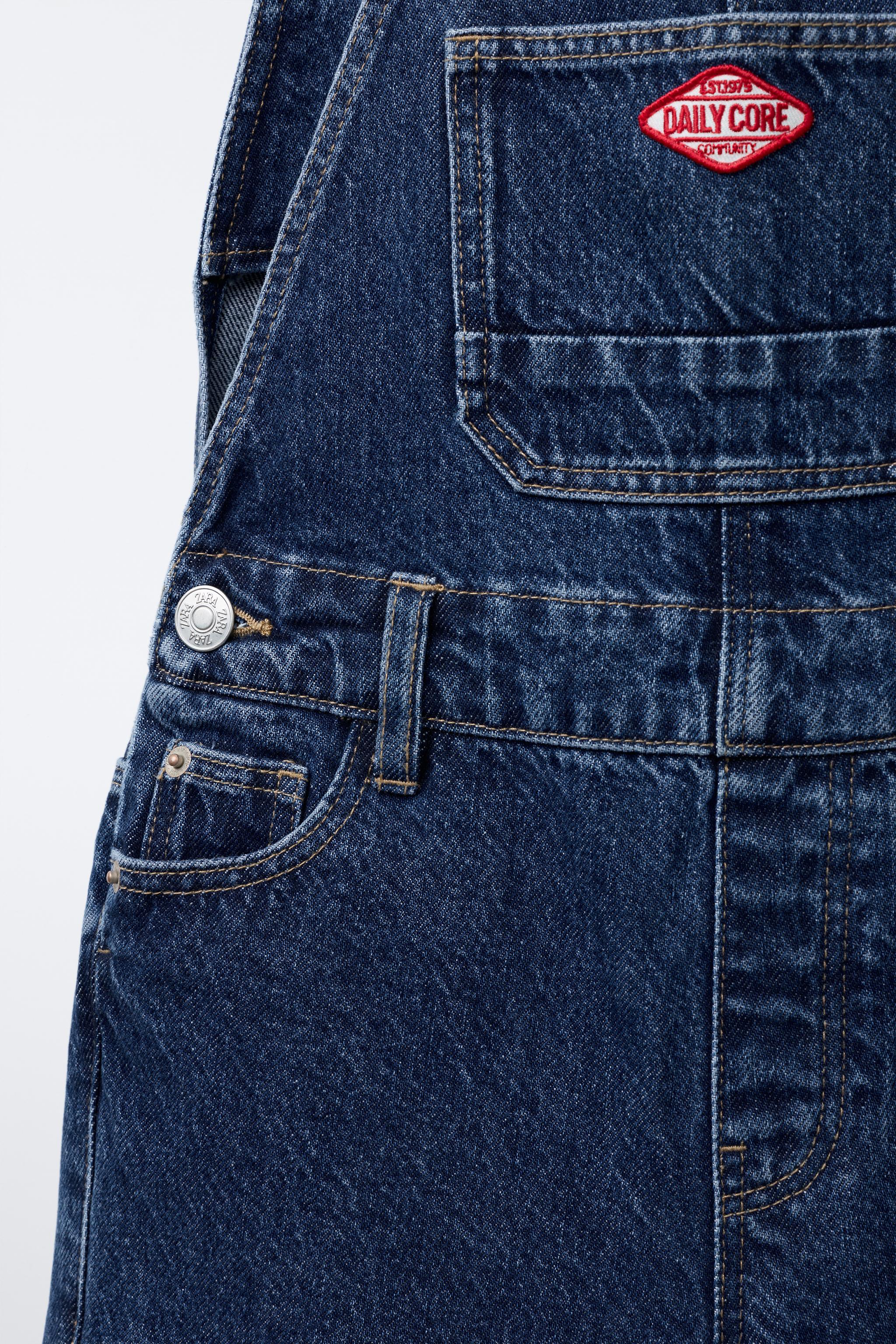 DENIM OVERALLS WITH LABEL