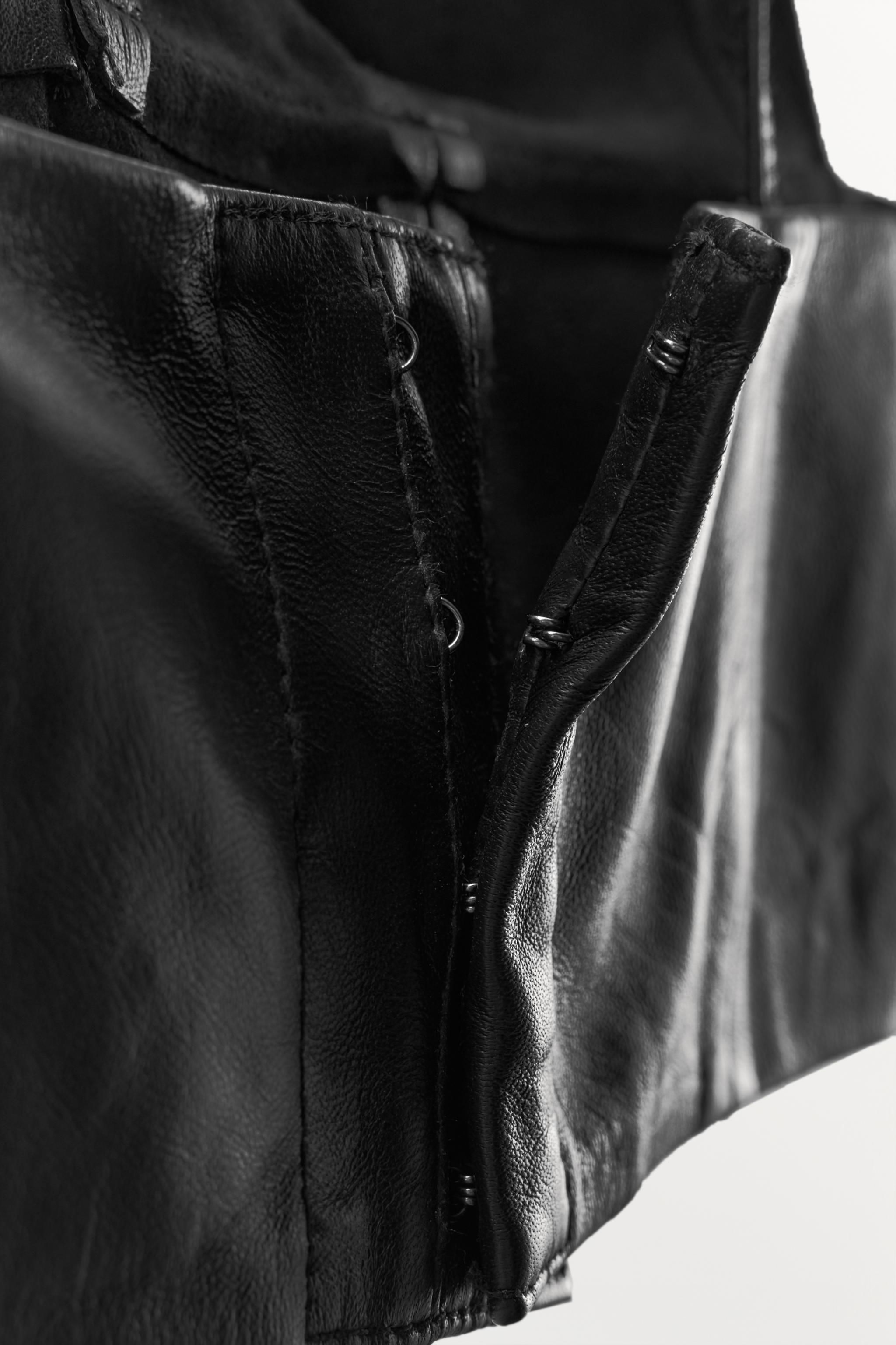 LEATHER TRIANGLE TOP