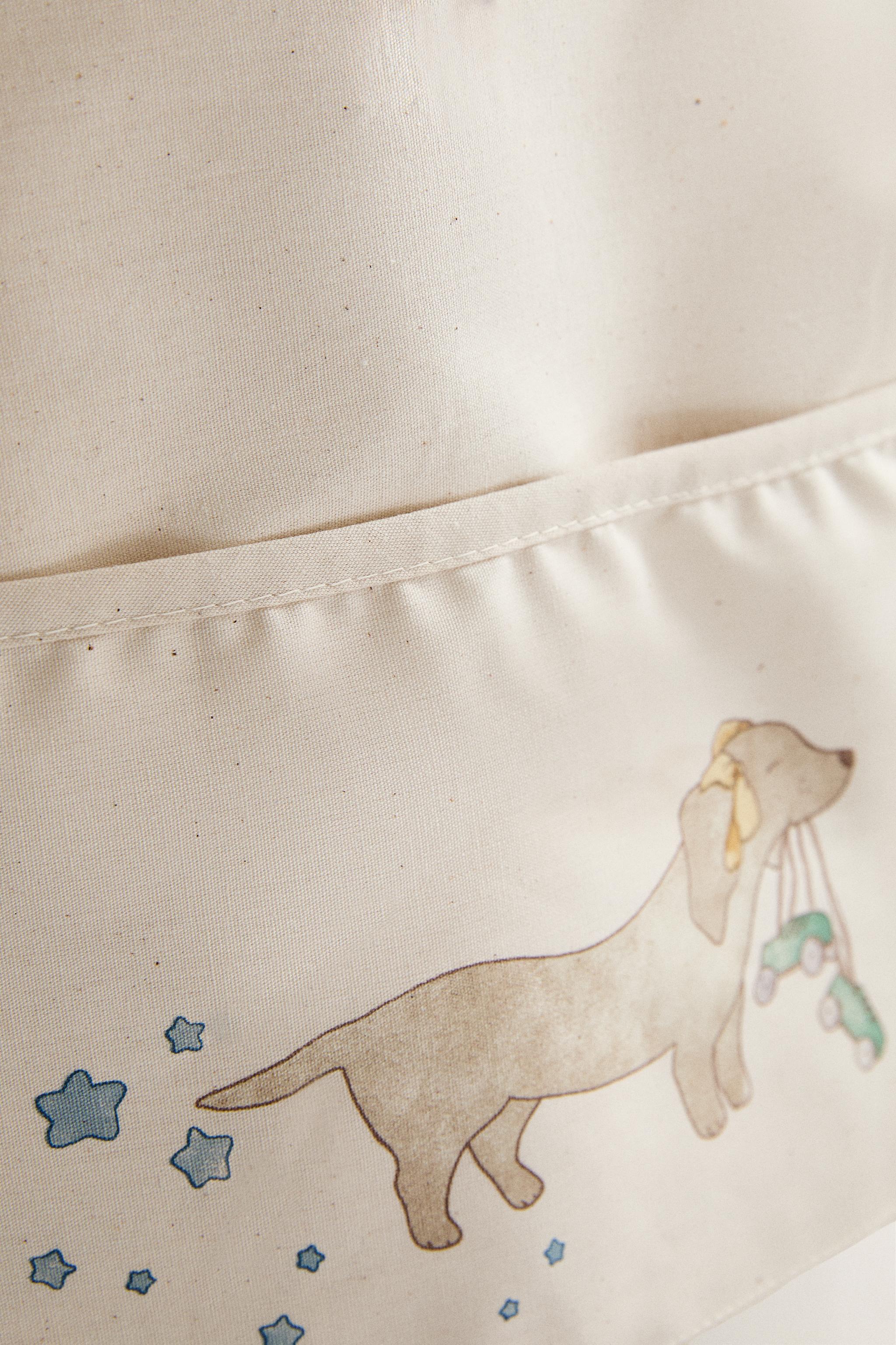 CHILDREN'S SKATING DOG BIB WITH SLEEVES