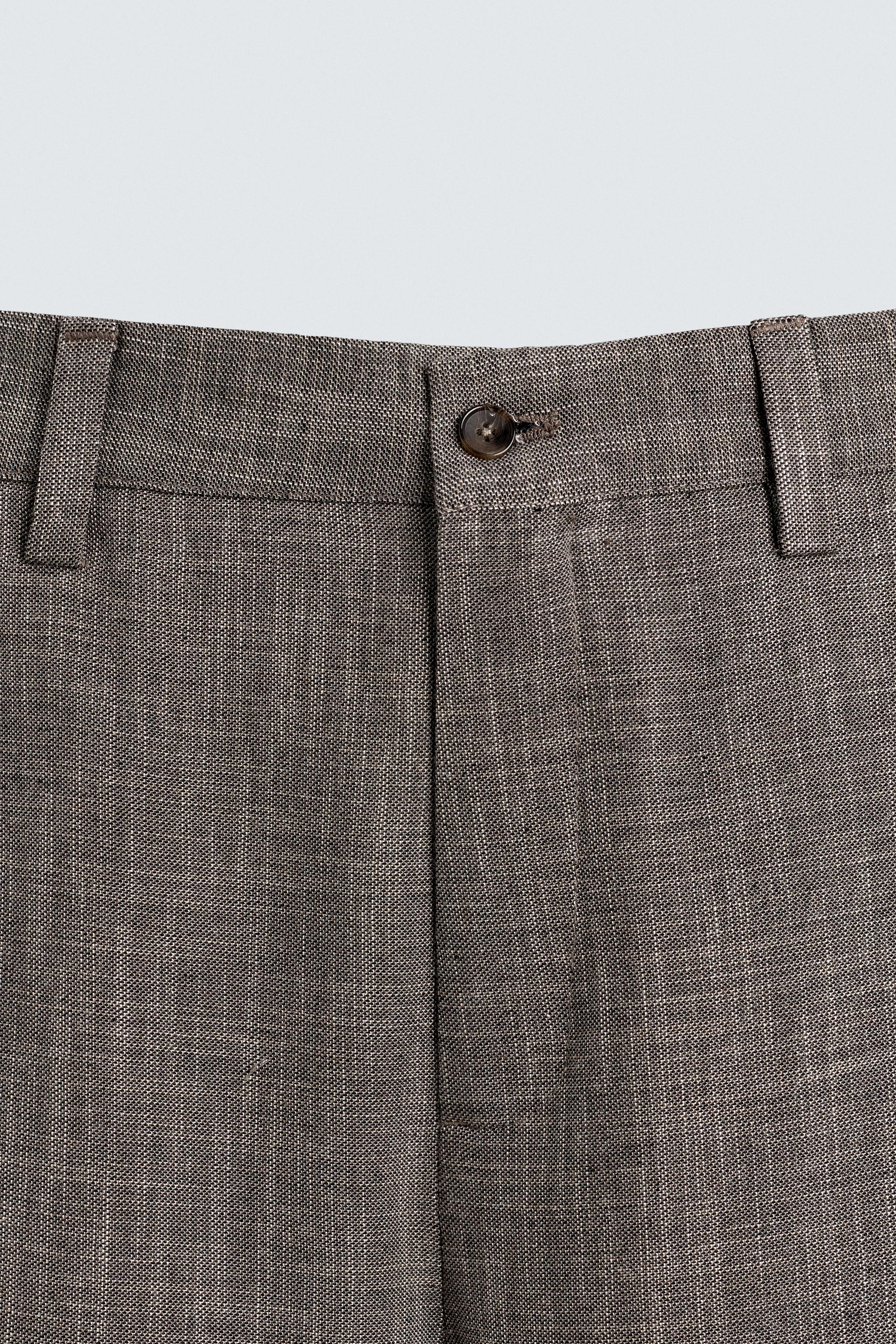 TEXTURED SUIT PANTS