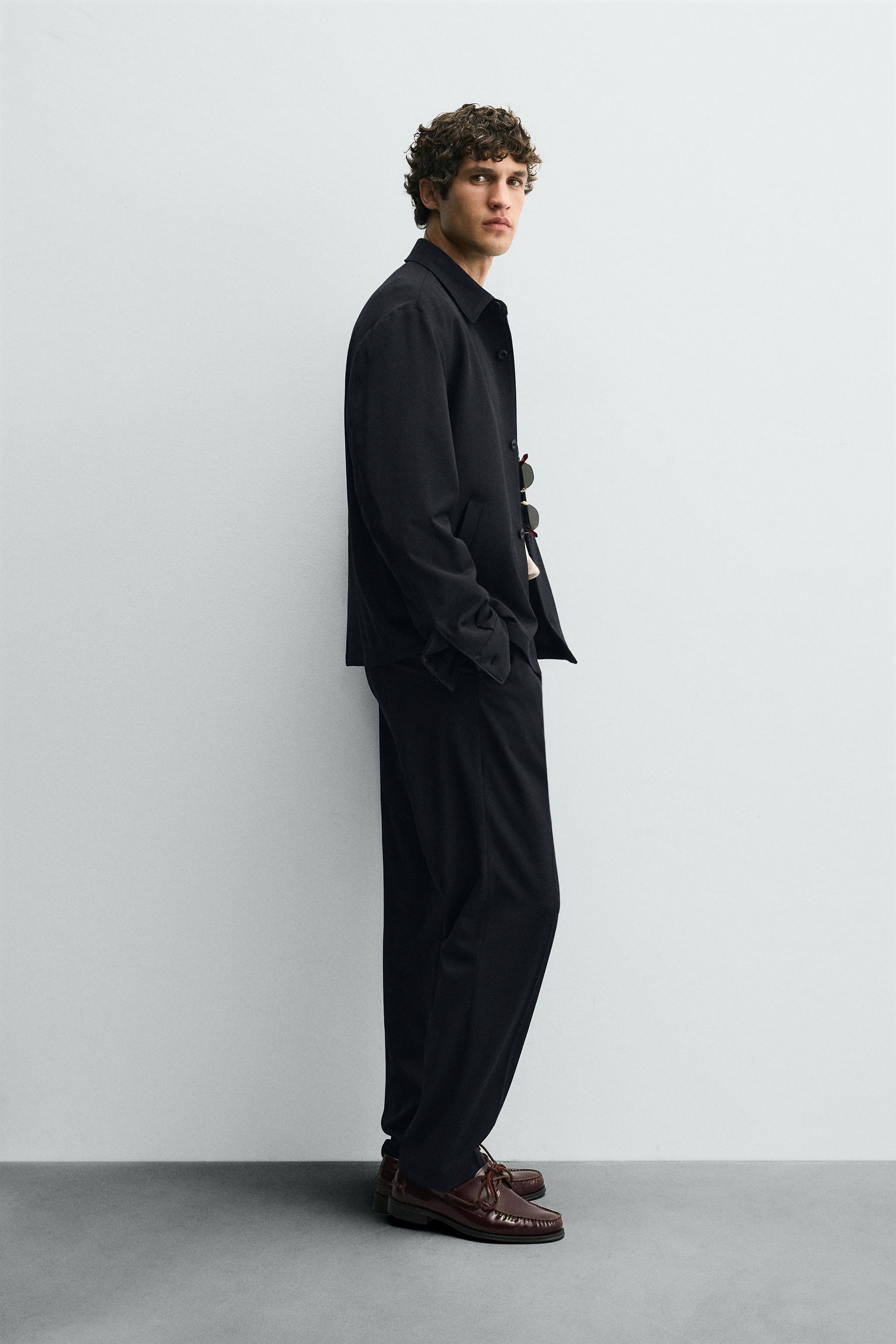 REGULAR FIT PLEATED PANTS