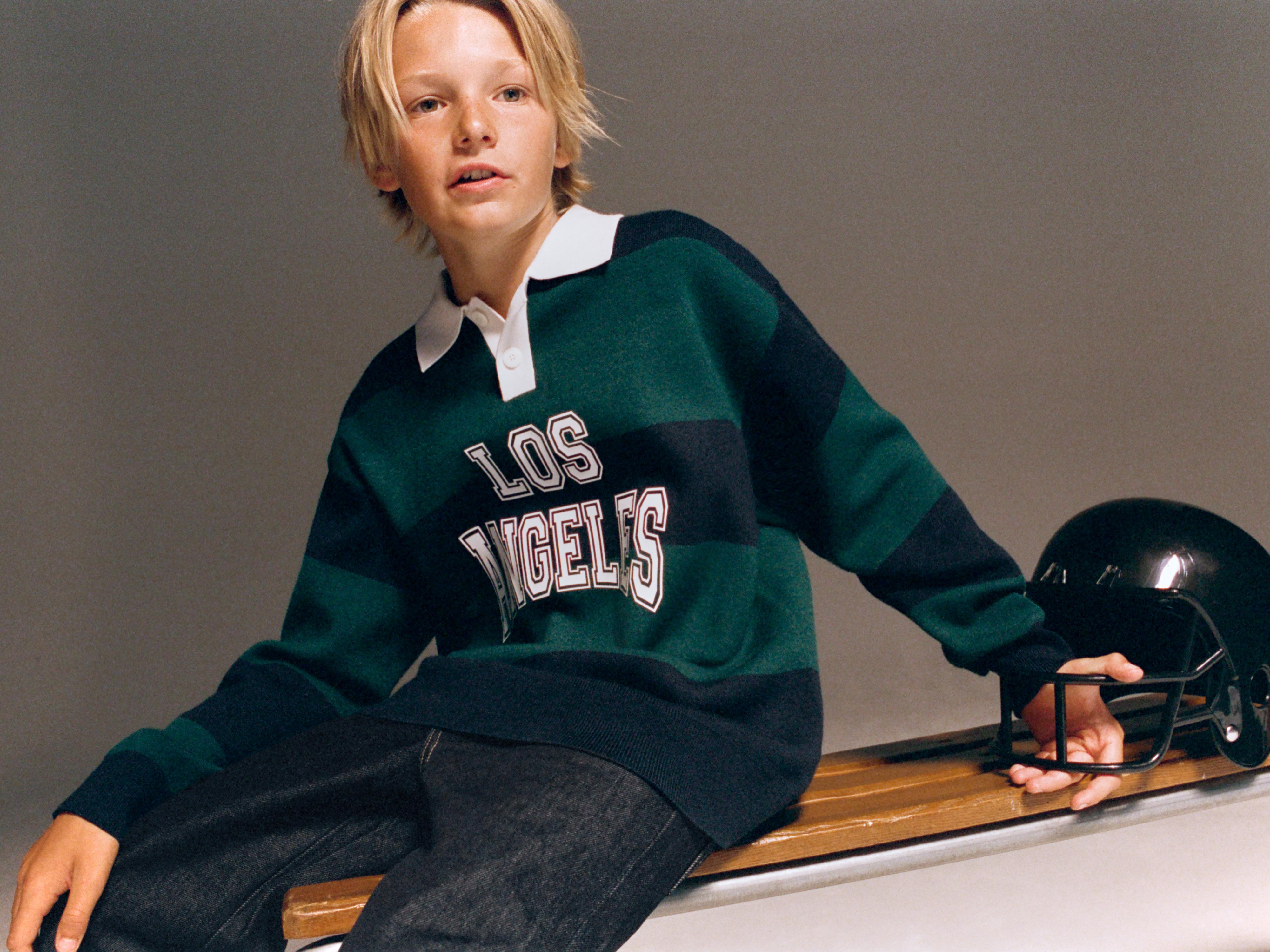 STRIPED VARSITY KNIT POLO SWEATER