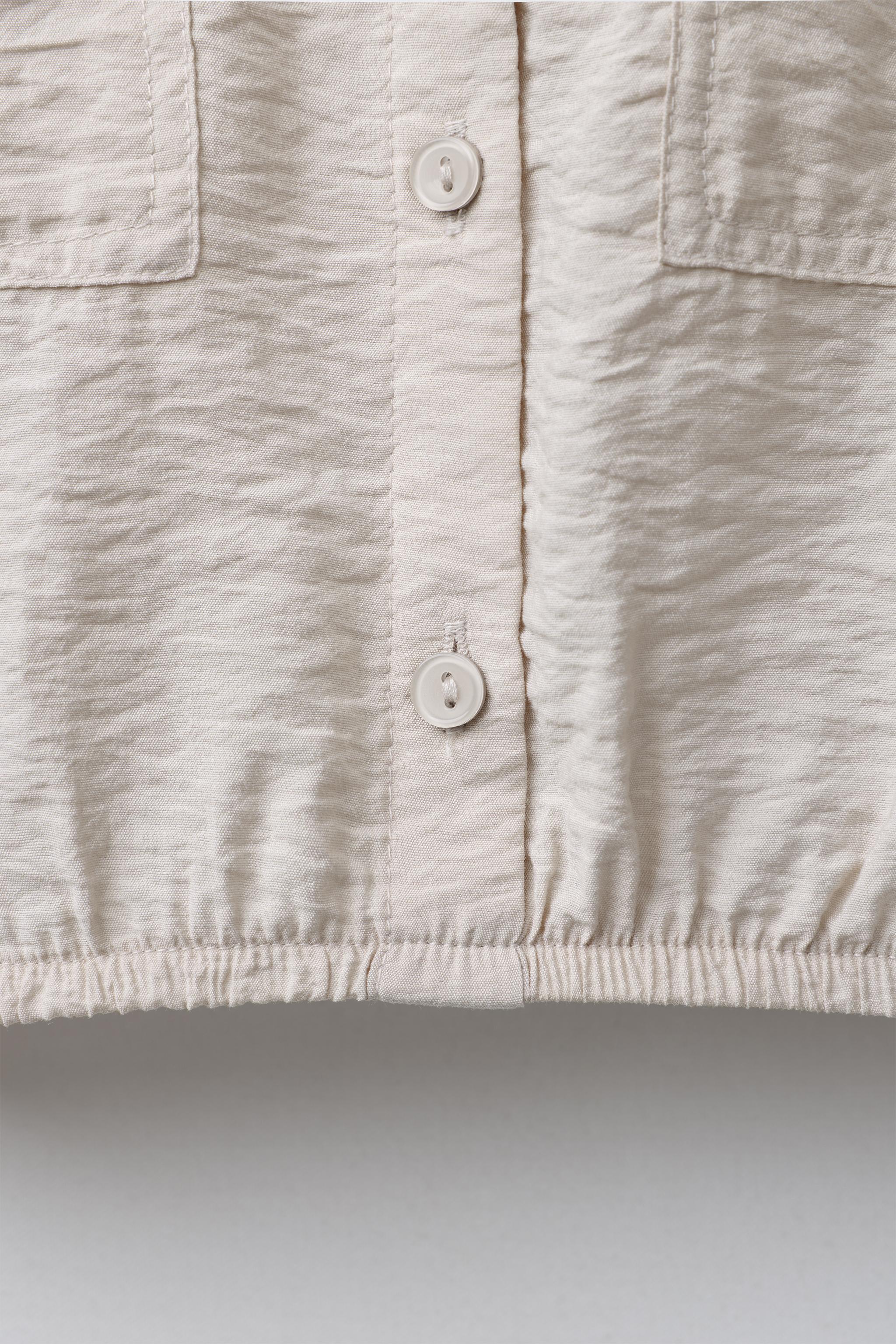 FLOWY SHIRT WITH ELASTIC