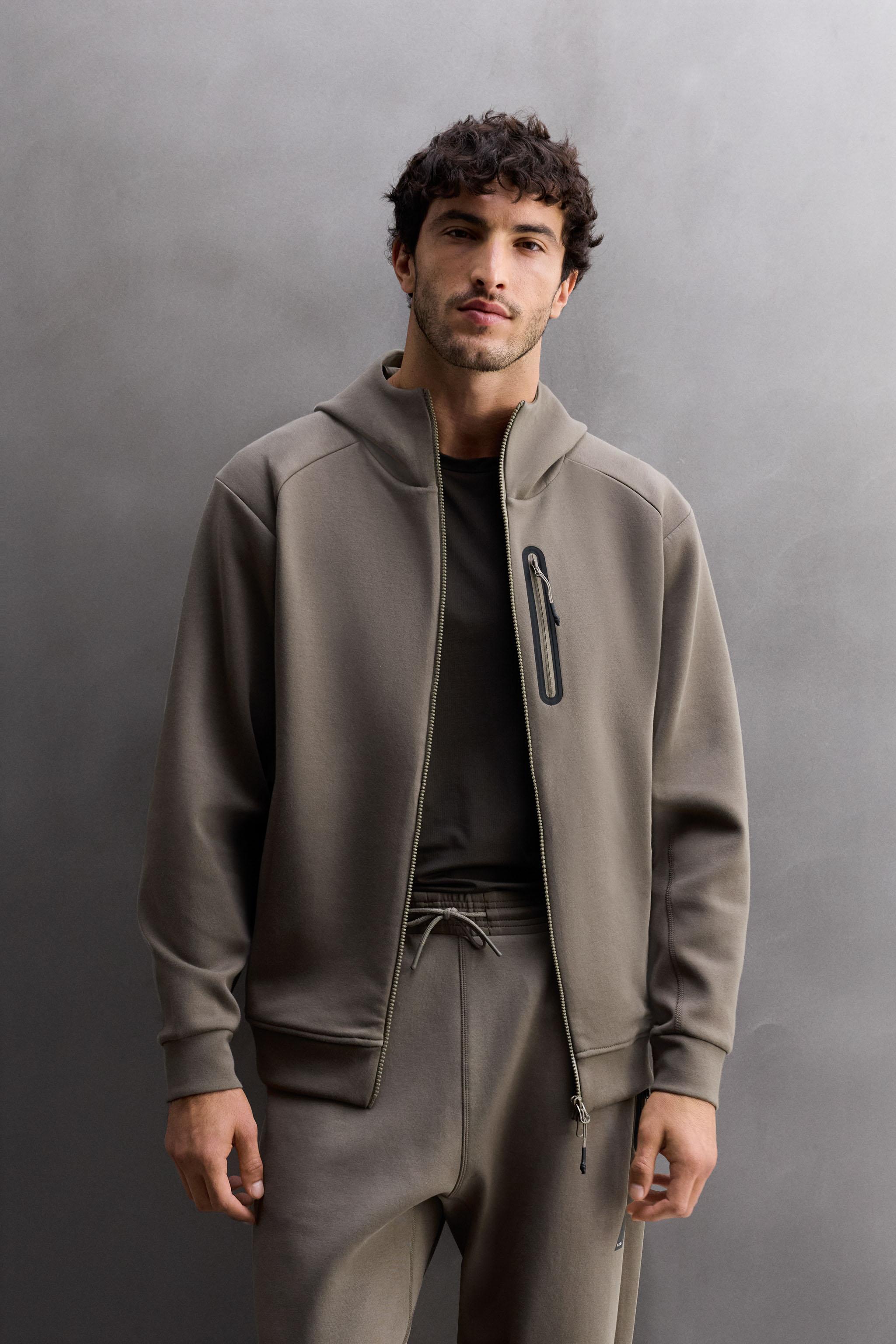 TECHNICAL ZIP-UP HOODIE