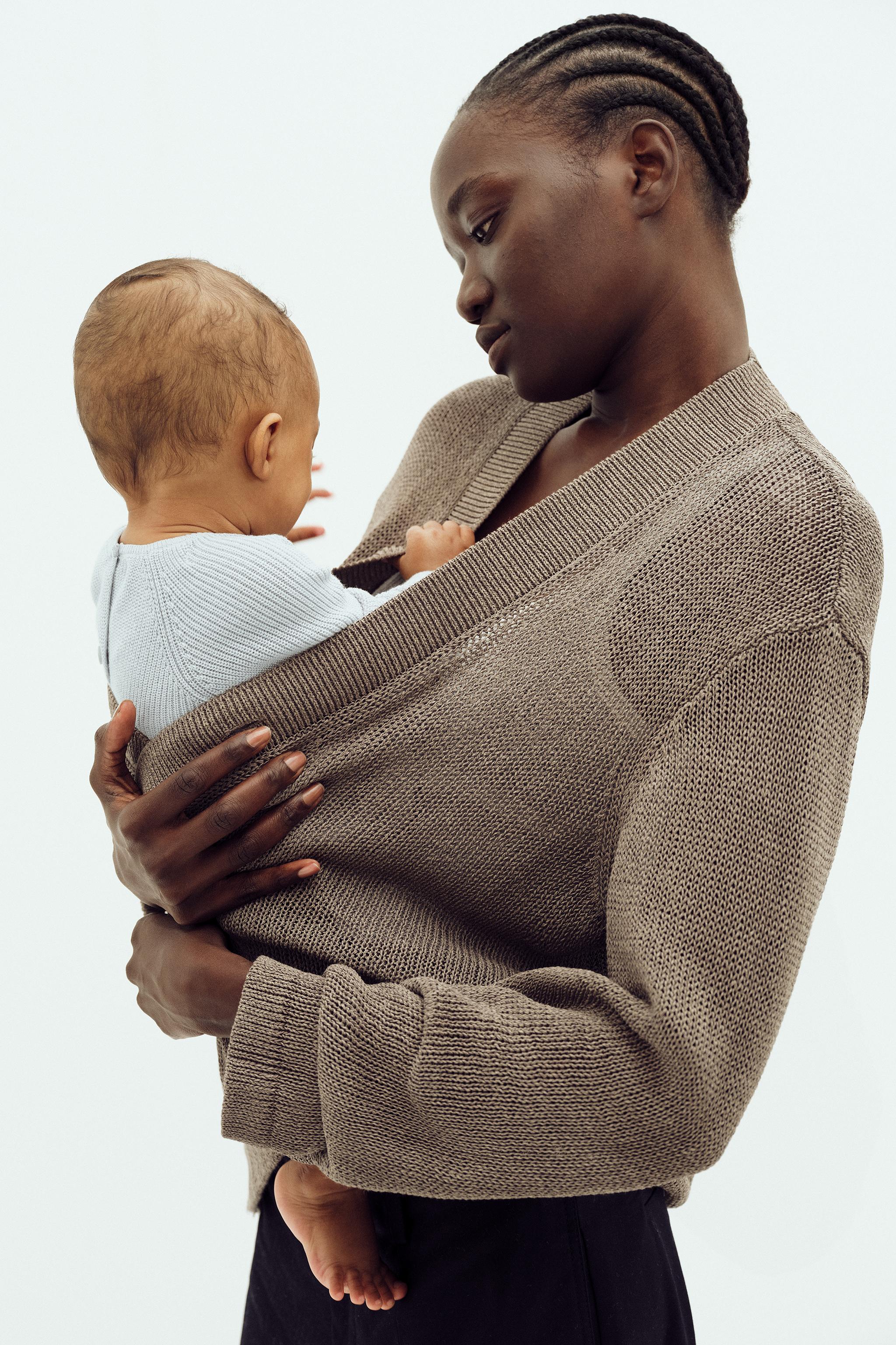 EMBROIDERED ELEPHANT PURL KNIT SWEATER