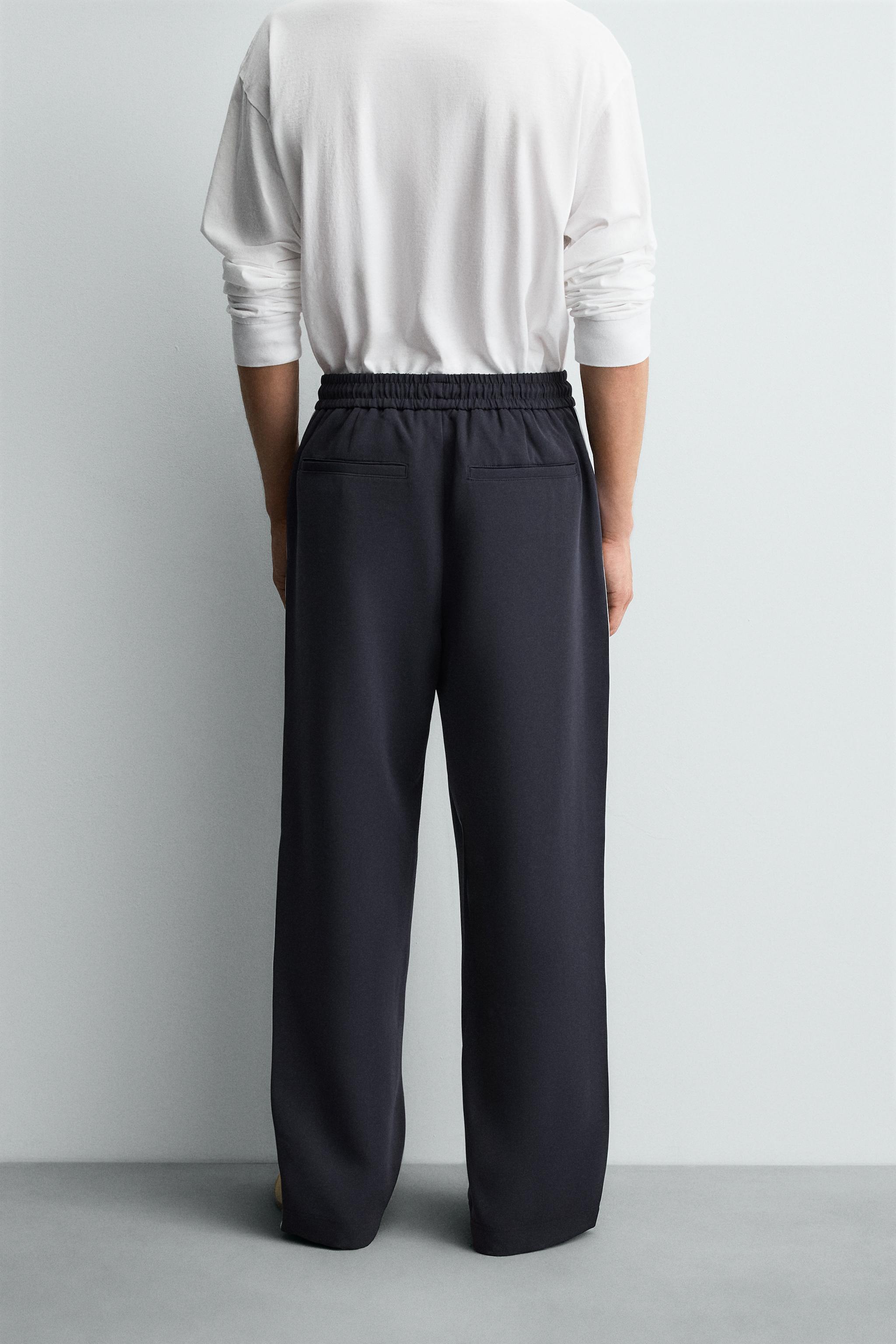 WIDE FIT JOGGER PANTS WITH SIDE STRIPES