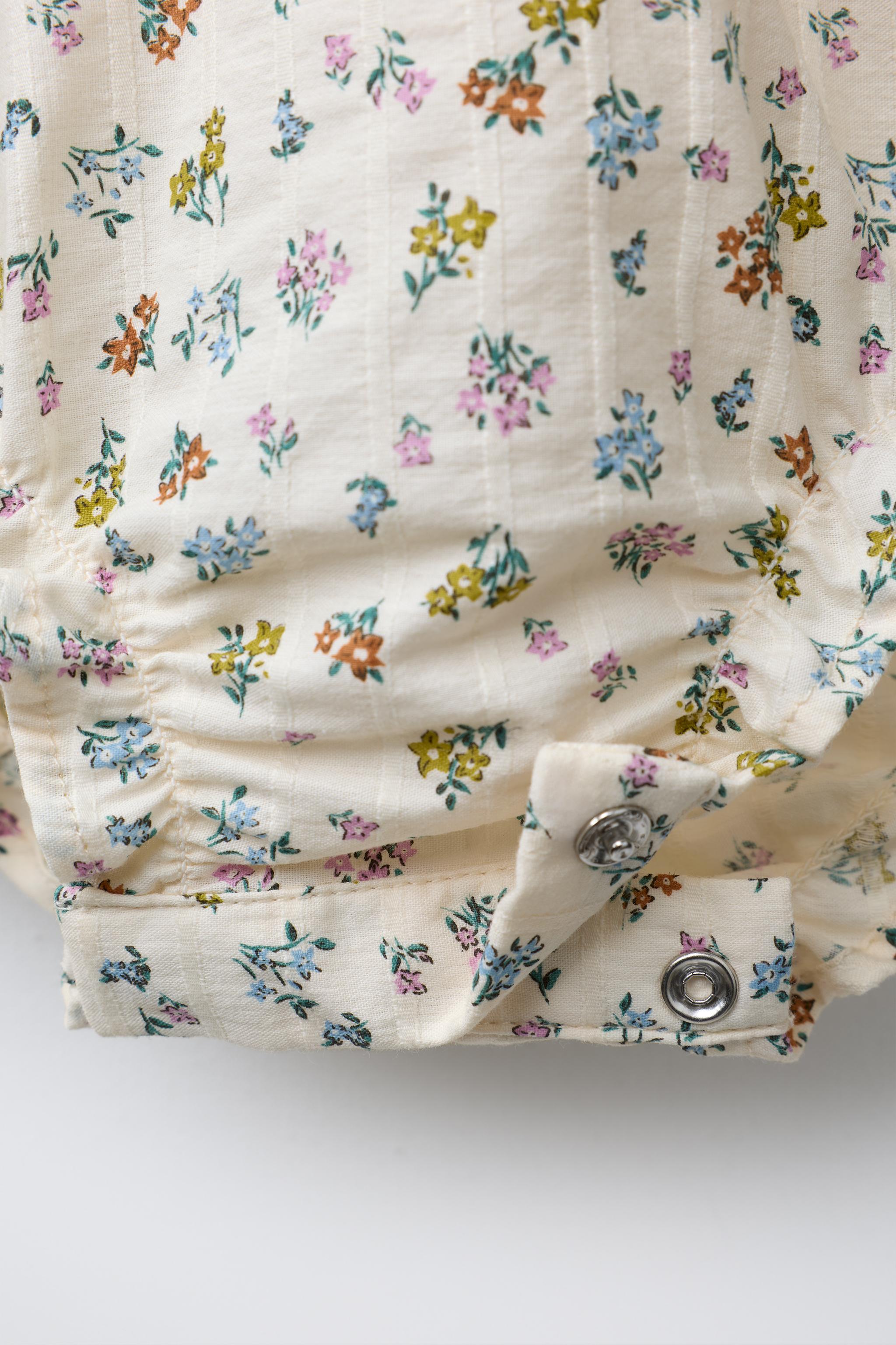 TEXTURED FLORAL BODYSUIT