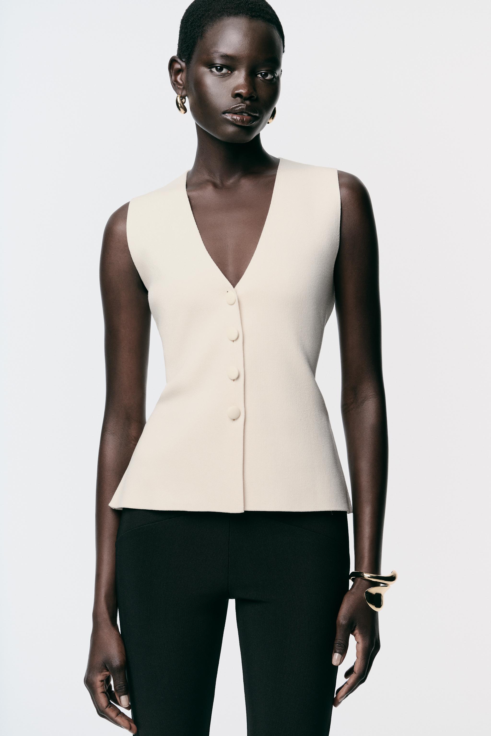 COVERED BUTTON KNIT VEST