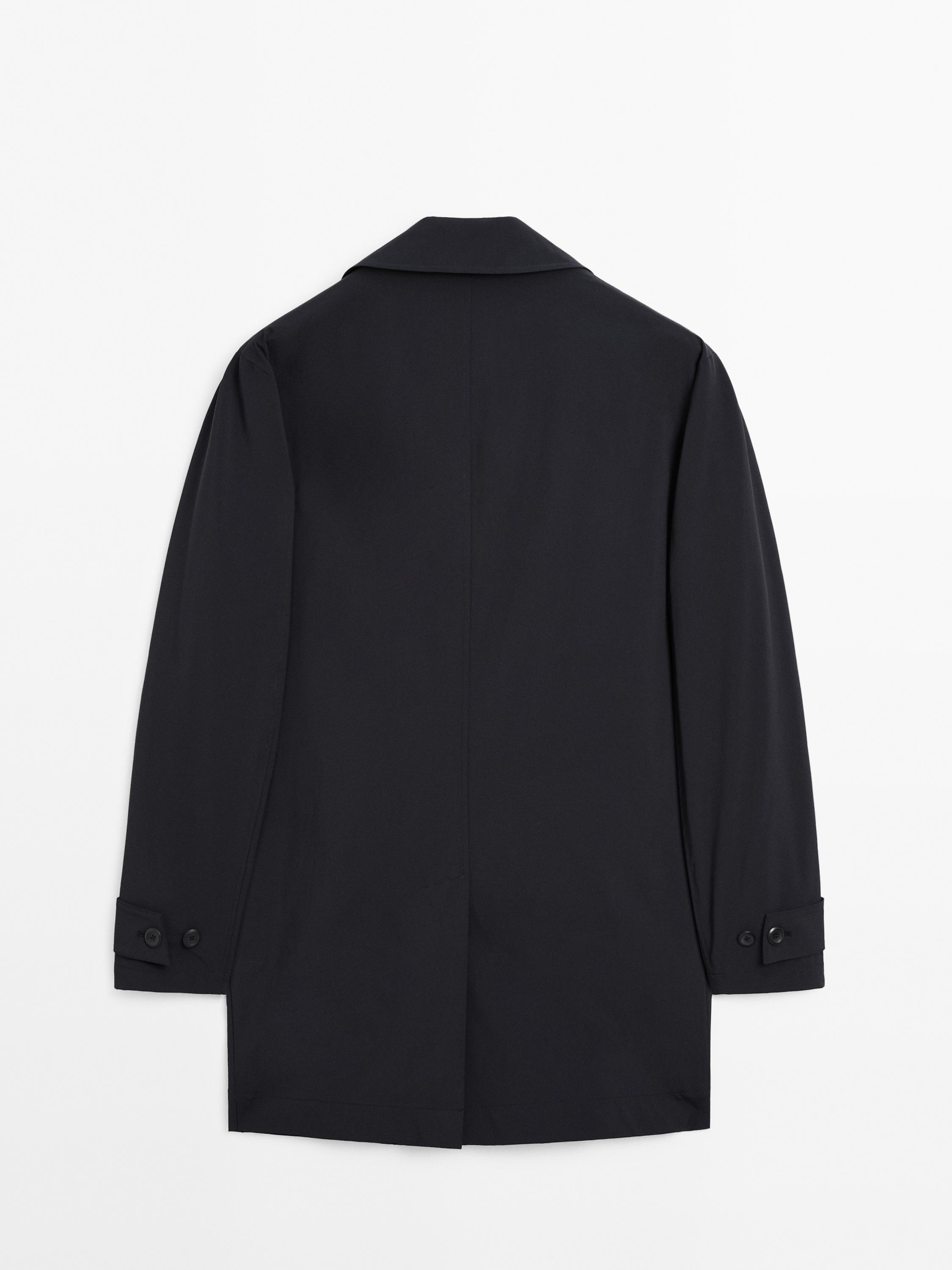 Lightweight trench coat with hidden buttons