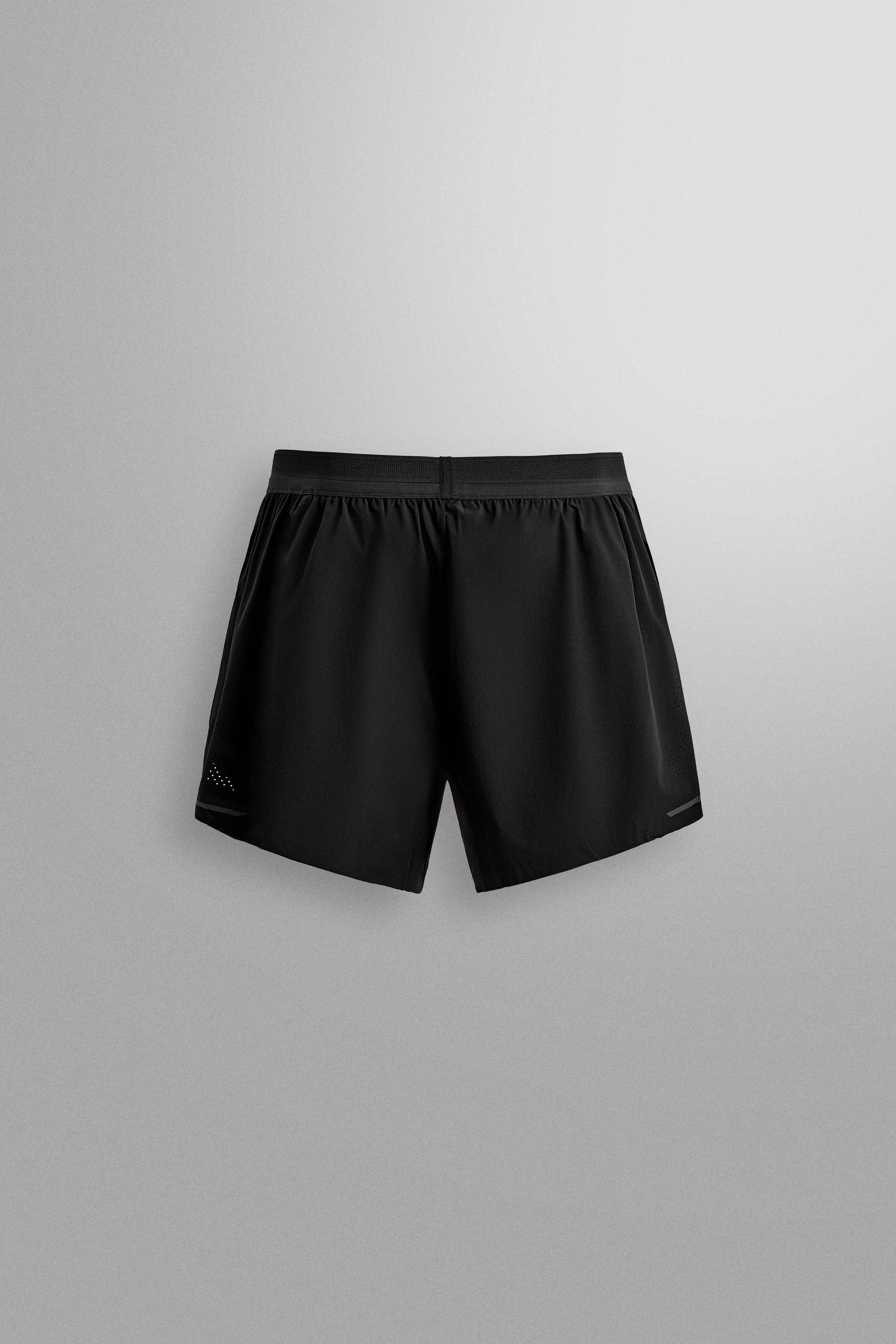 SHORT RUNNING SHORTS