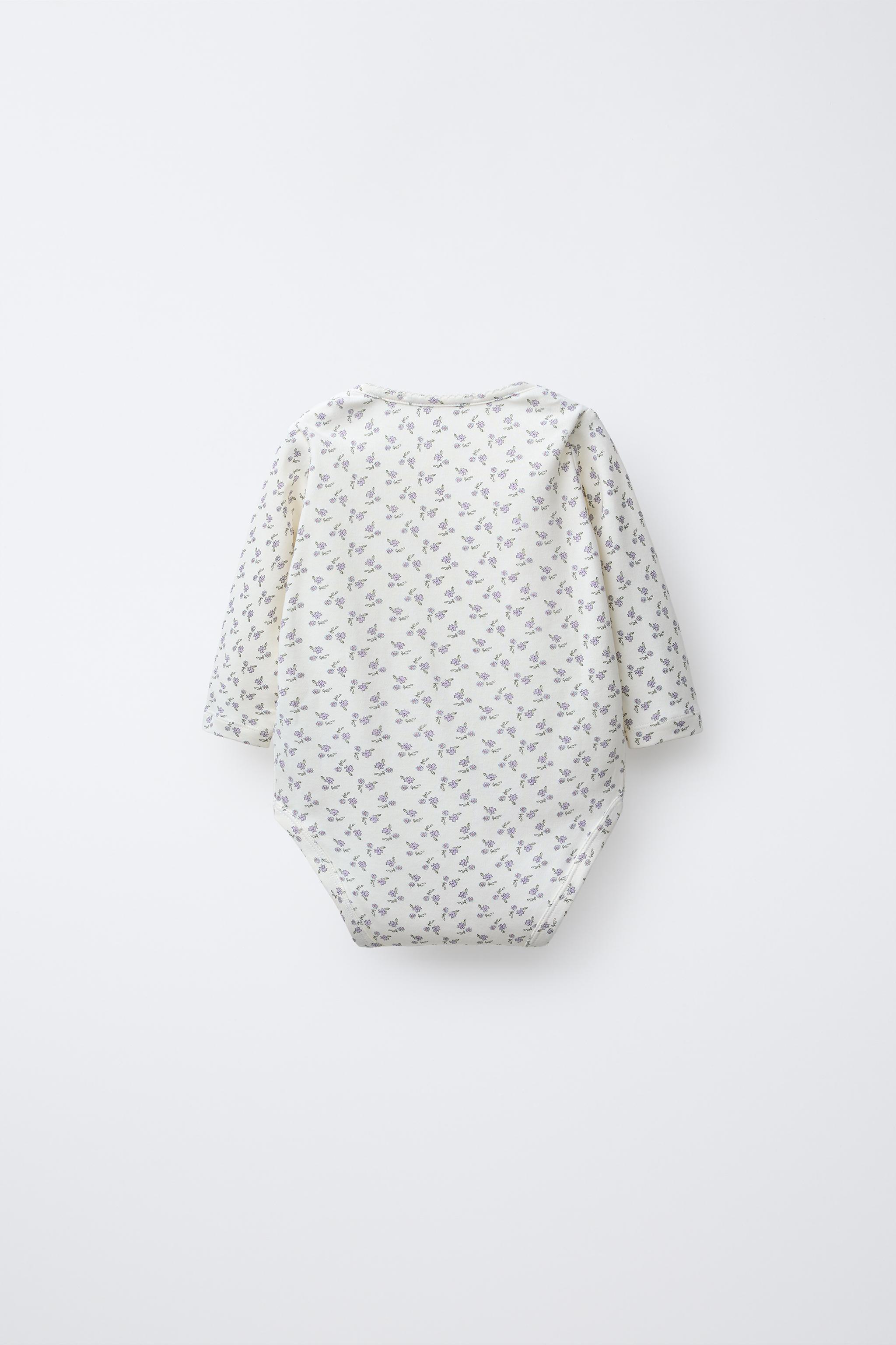 FIVE-PACK OF FLORAL BODYSUITS