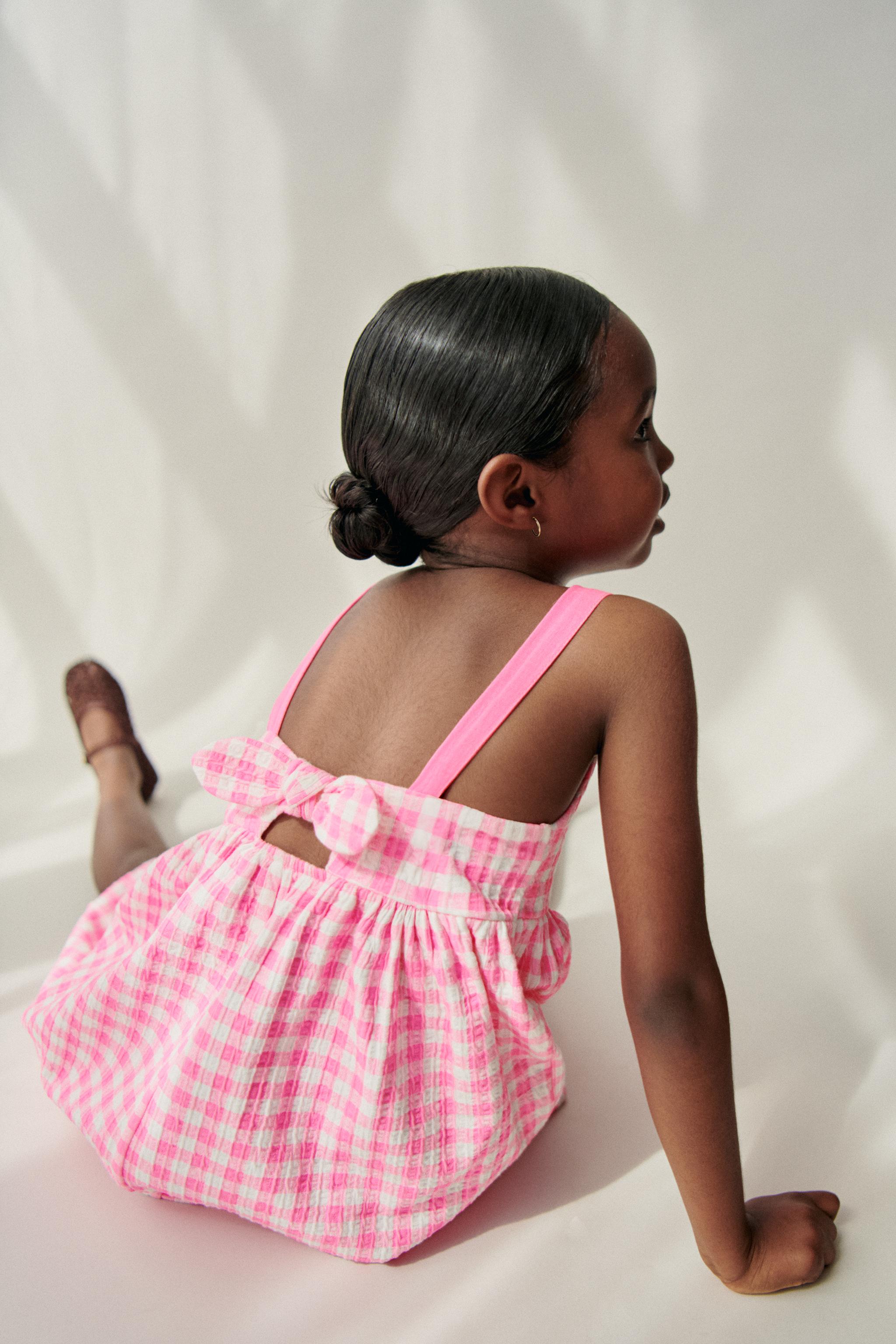 TEXTURED PRINTED BOW DRESS