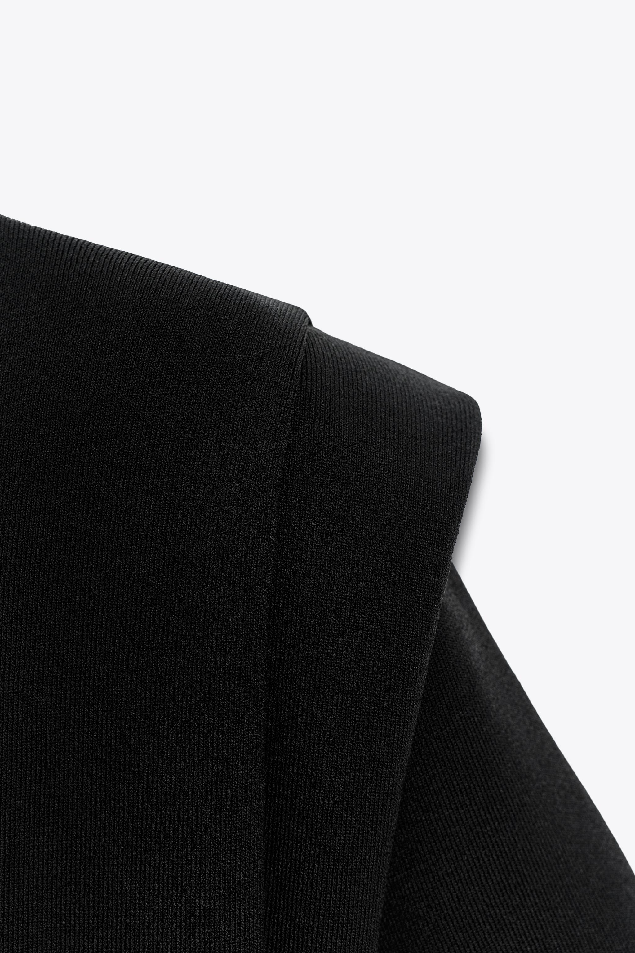 SHOULDER PAD KNIT TOP