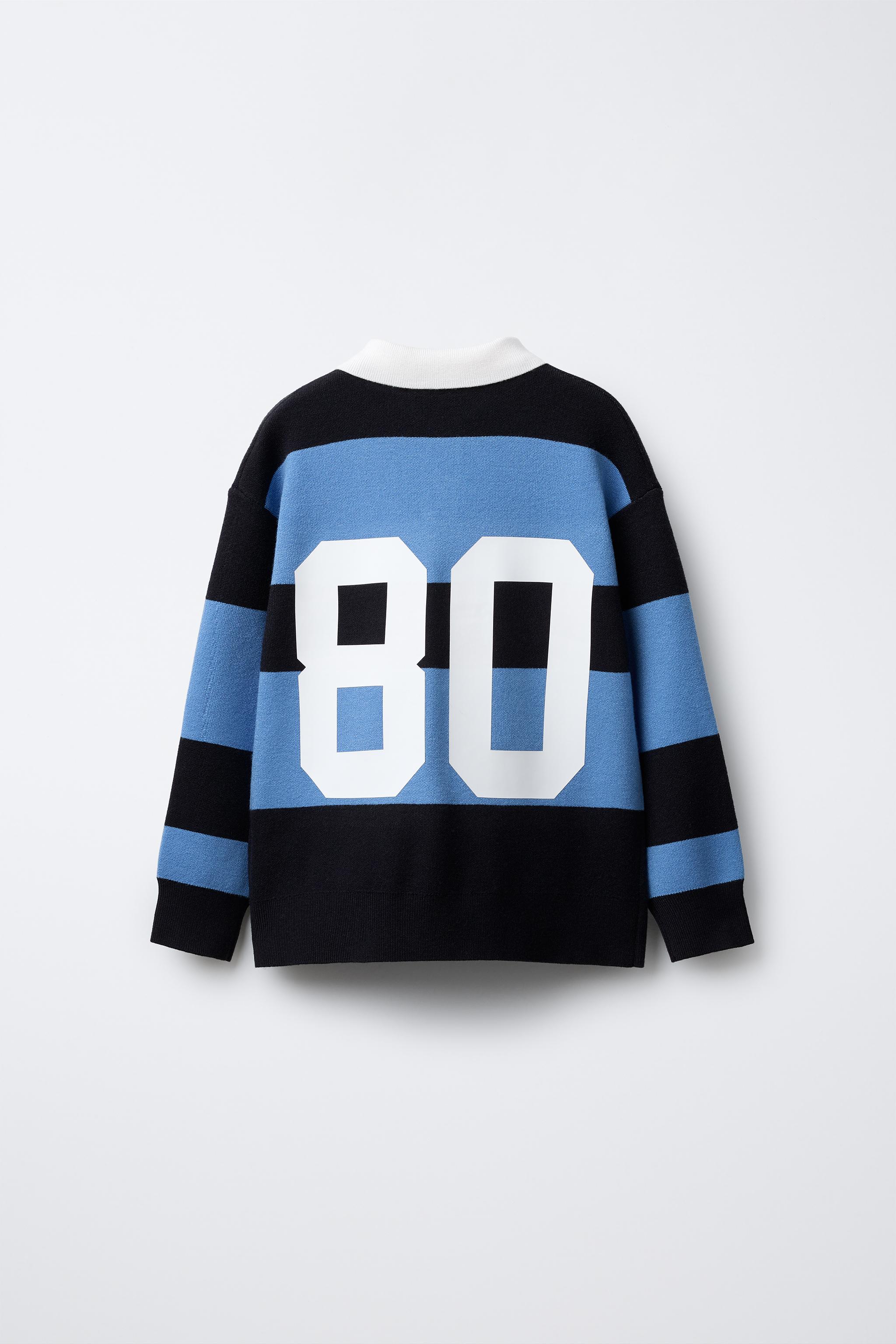 STRIPED VARSITY KNIT POLO SWEATER