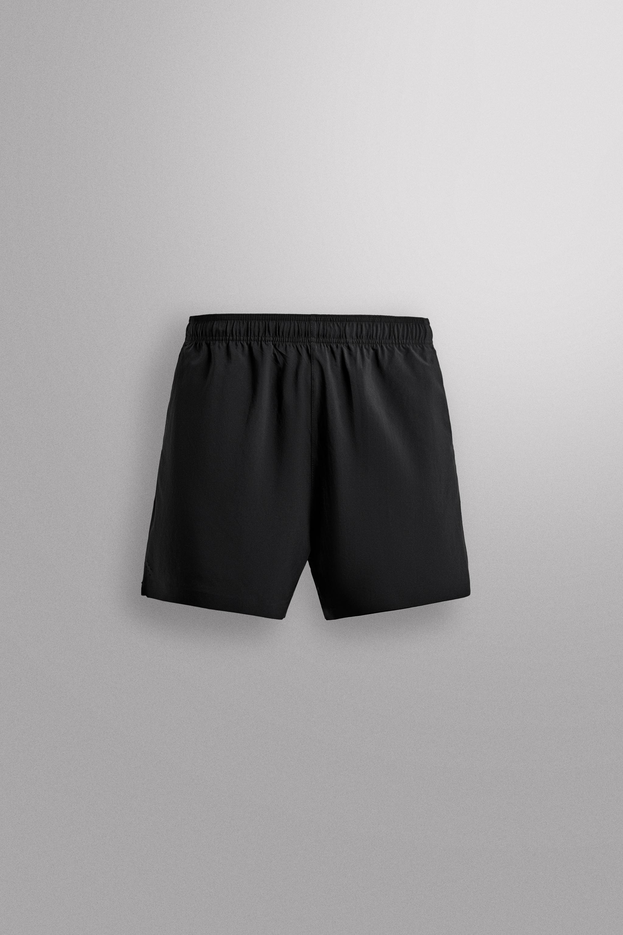 LIGHTWEIGHT PERFORATED SHORTS