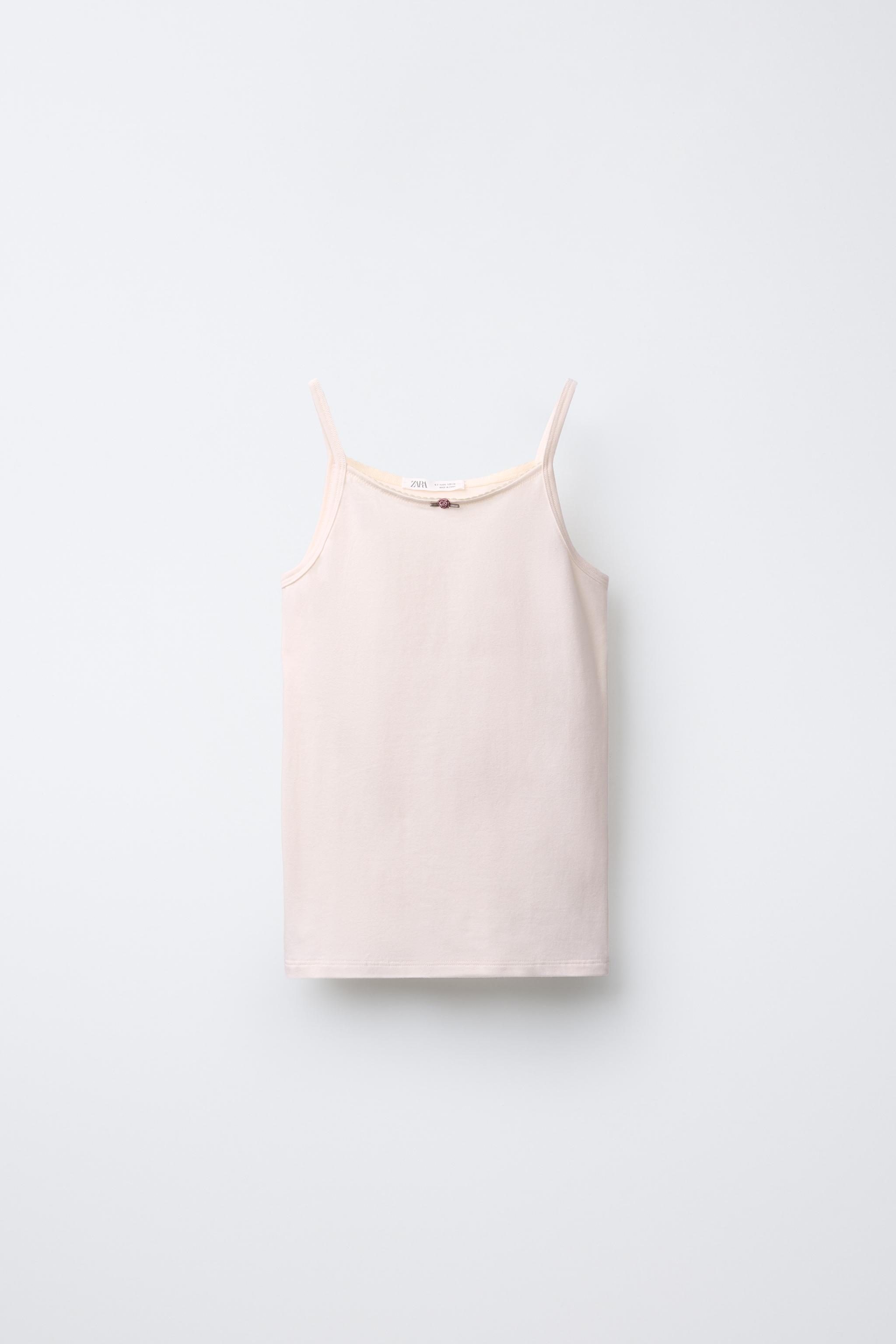 AGES 6-14/ TWO-PACK OF TANK TOPS WITH FLOWER DETAIL