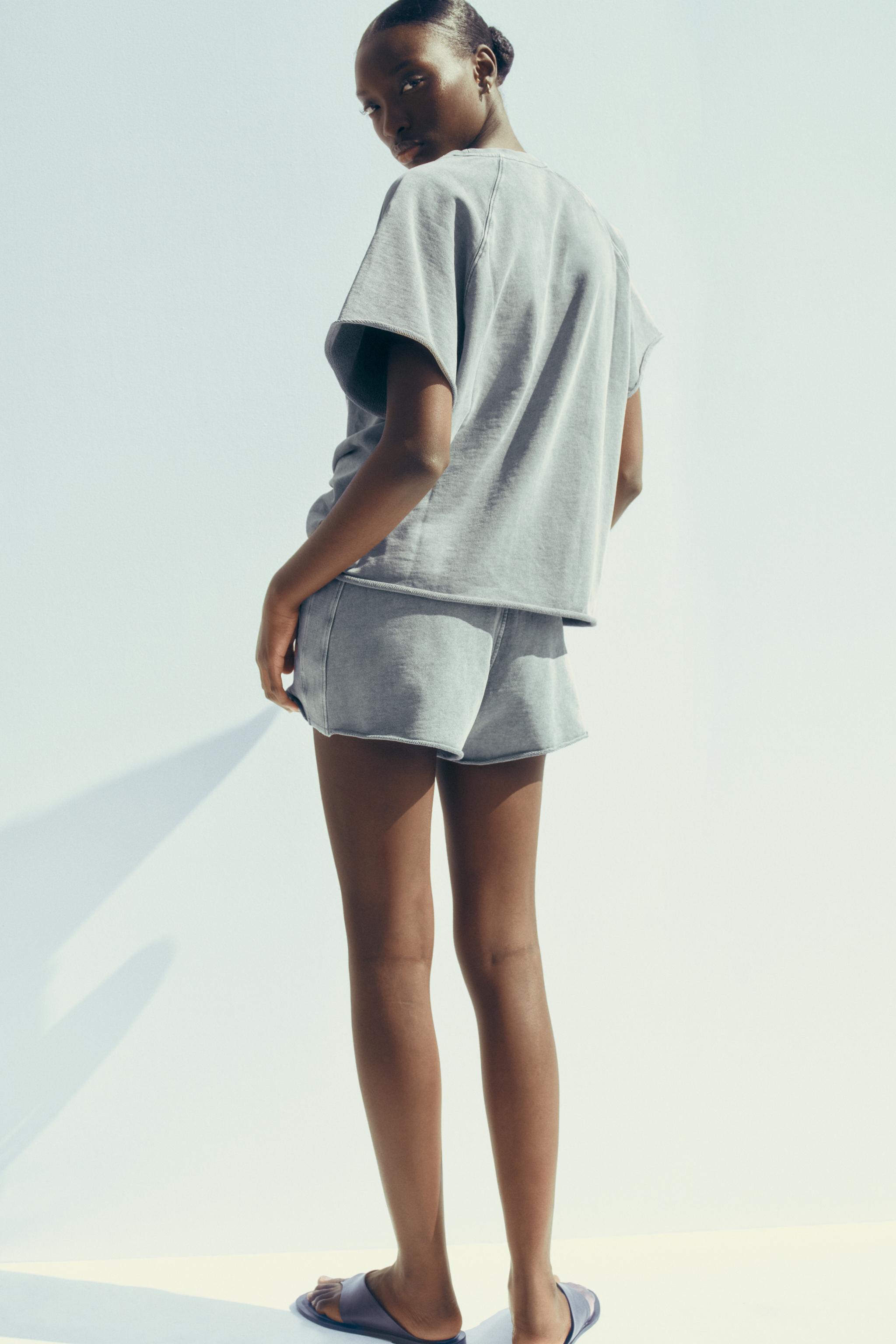 WASHED EFFECT TEXT PLUSH SWEATSHIRT