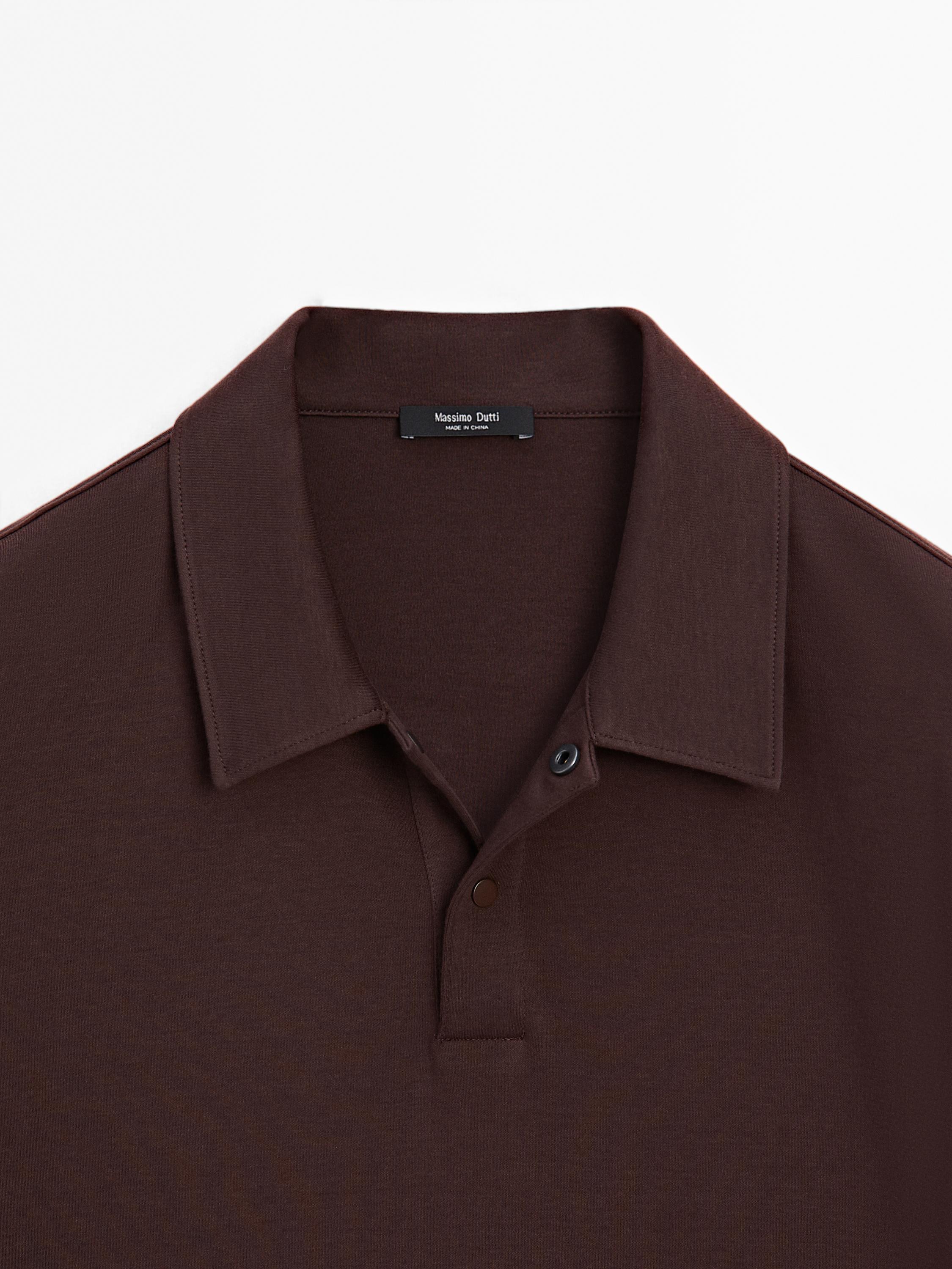 Short sleeve polo shirt with snap-button placket