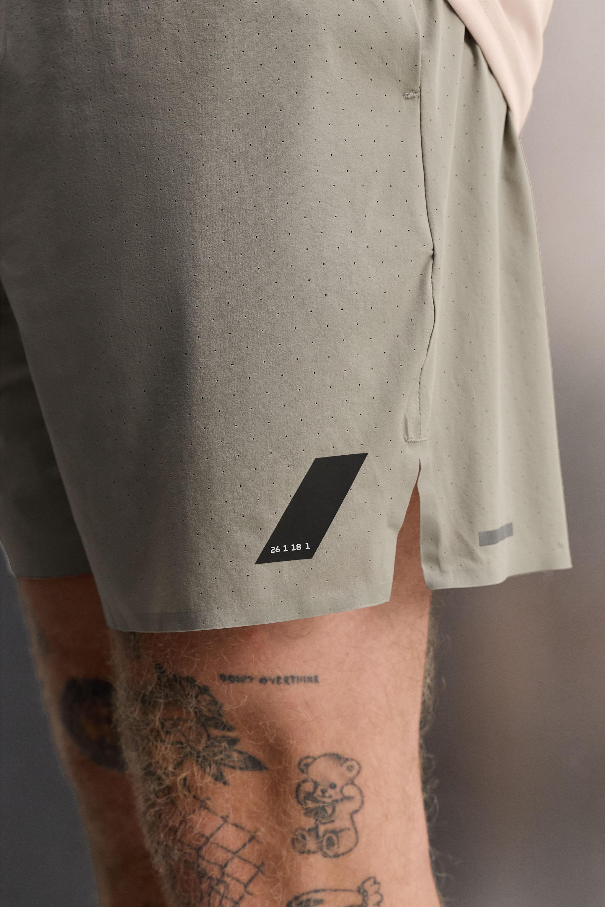 LIGHTWEIGHT PERFORATED SHORTS