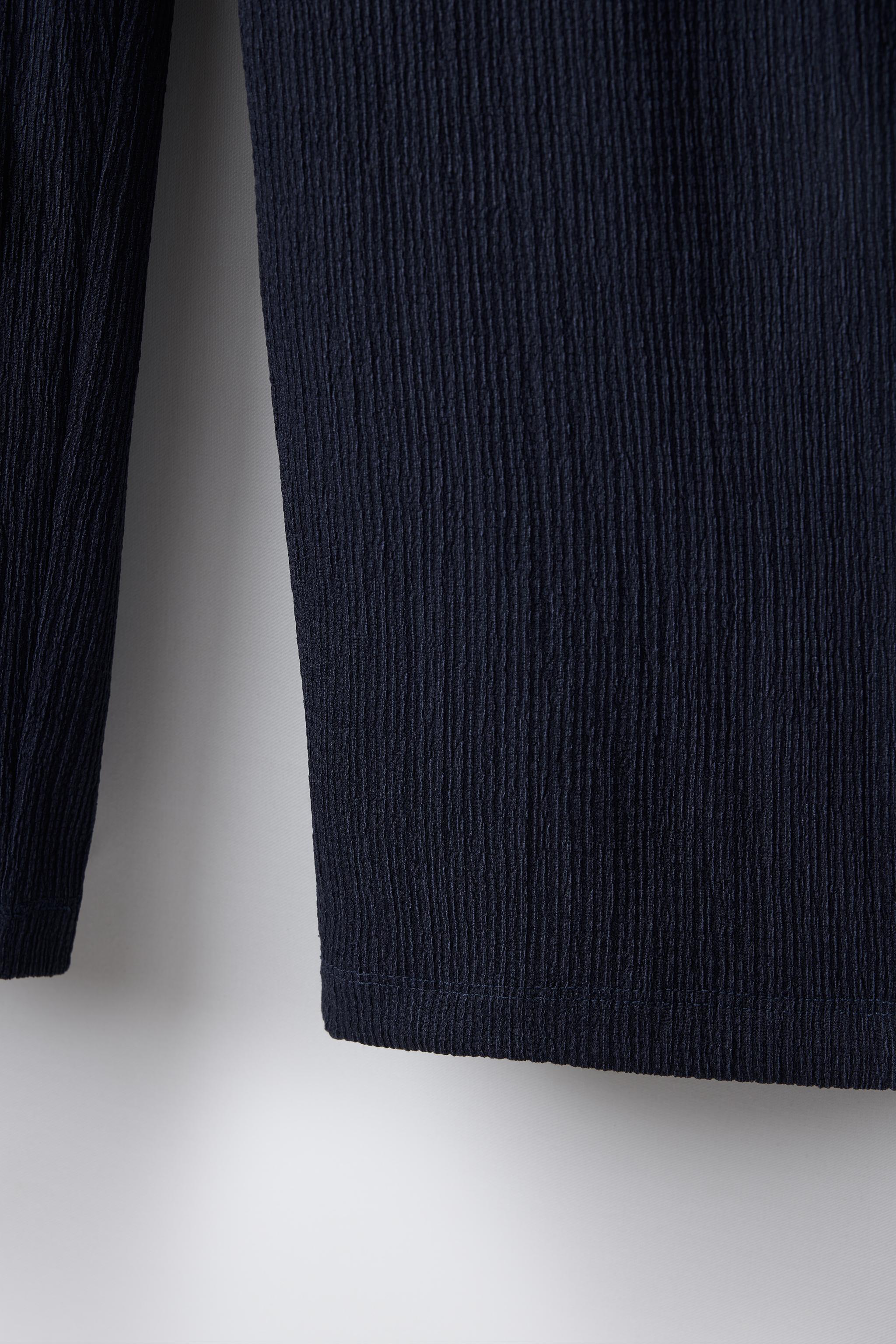 TEXTURED WIDE LEG BELTED PANTS