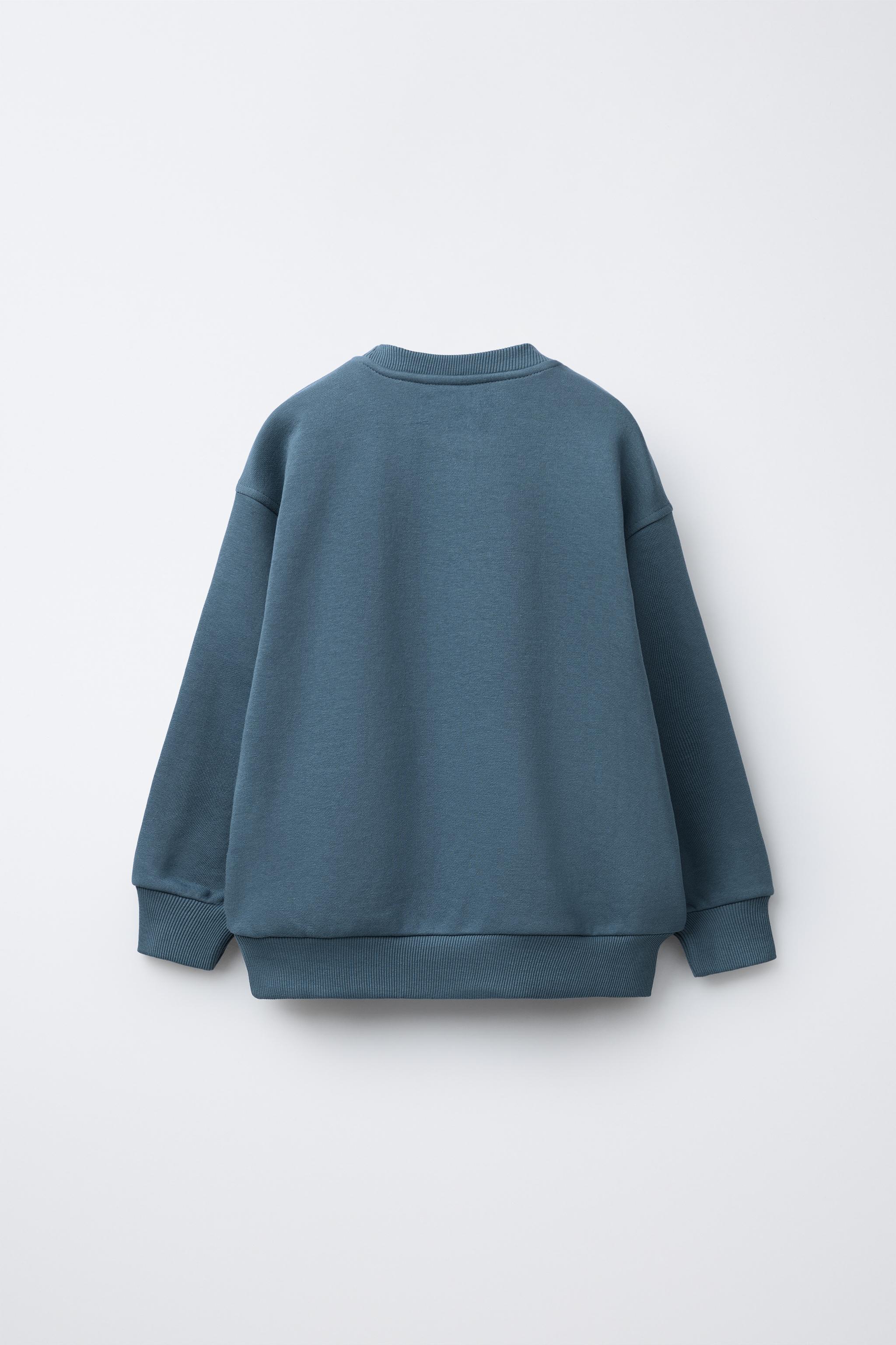 FLOCKED TEXT SWEATSHIRT