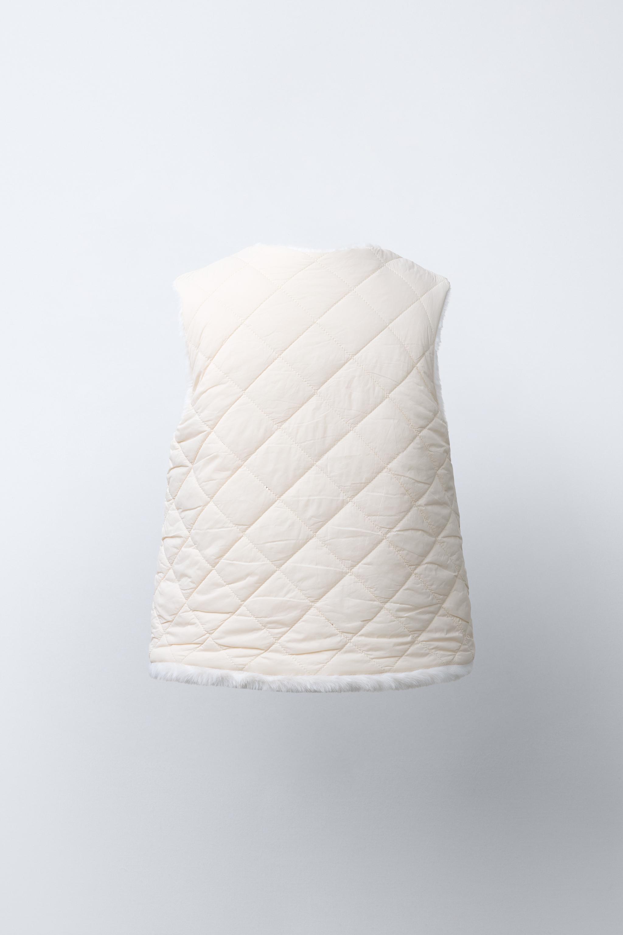 REVERSIBLE FAUX FUR VEST