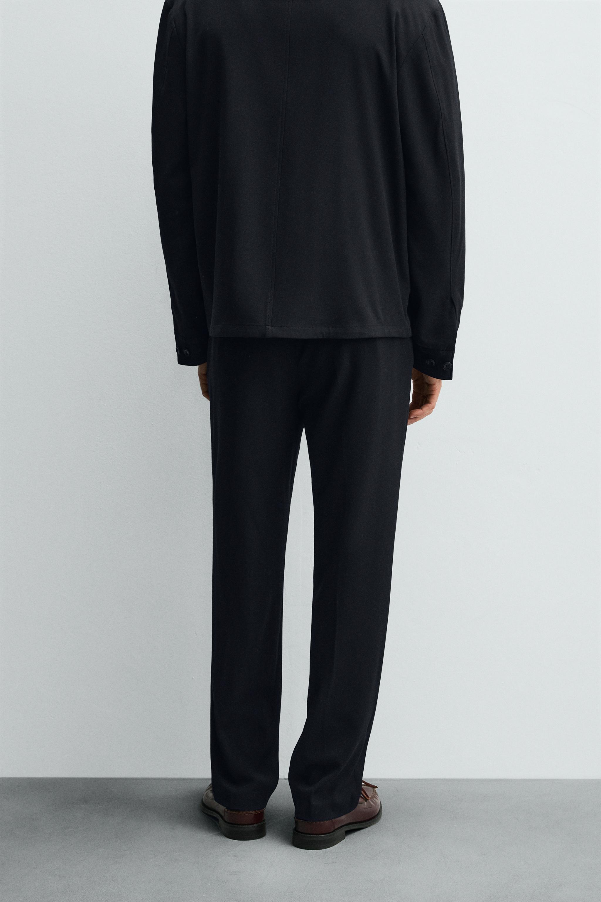 REGULAR FIT PLEATED PANTS