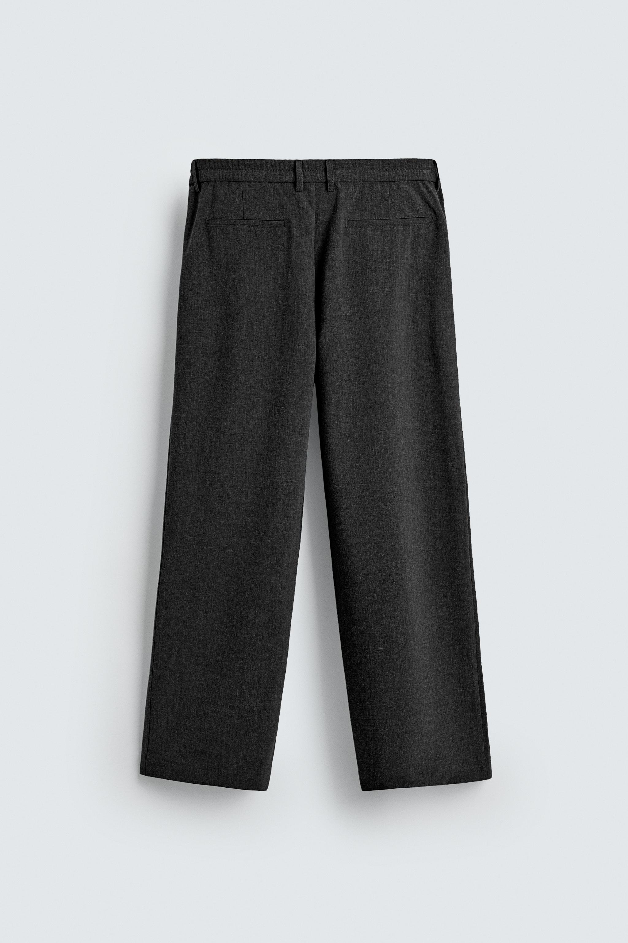 PLEATED WIDE FIT PANTS