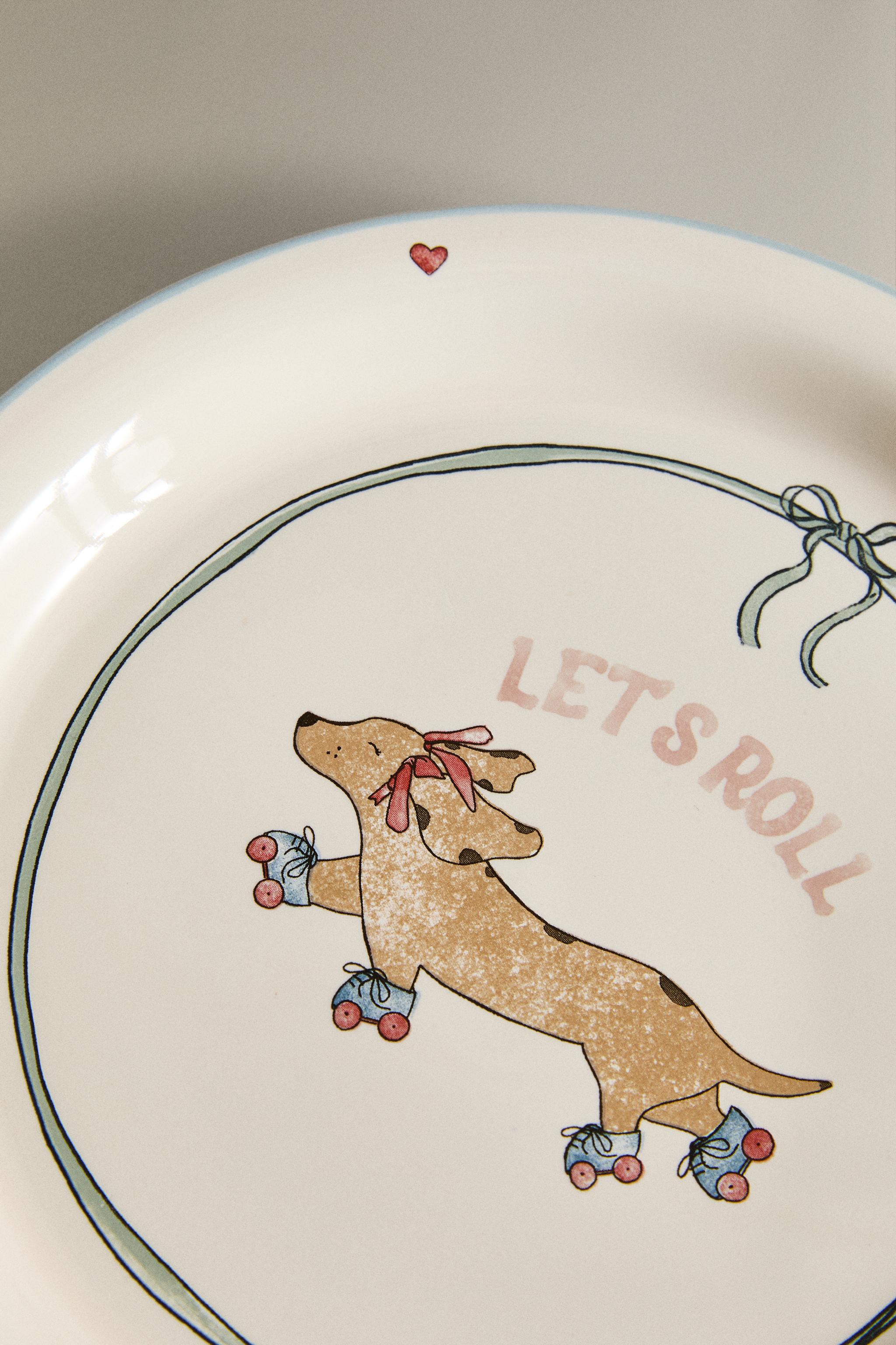 CHILDREN'S CERAMIC SKATING DOG PLATE