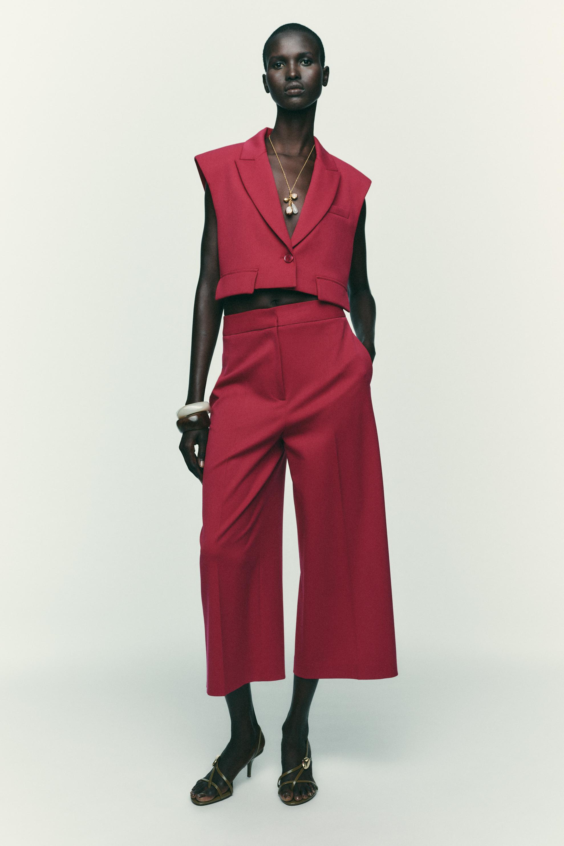 SHORT VEST WITH FLAPS