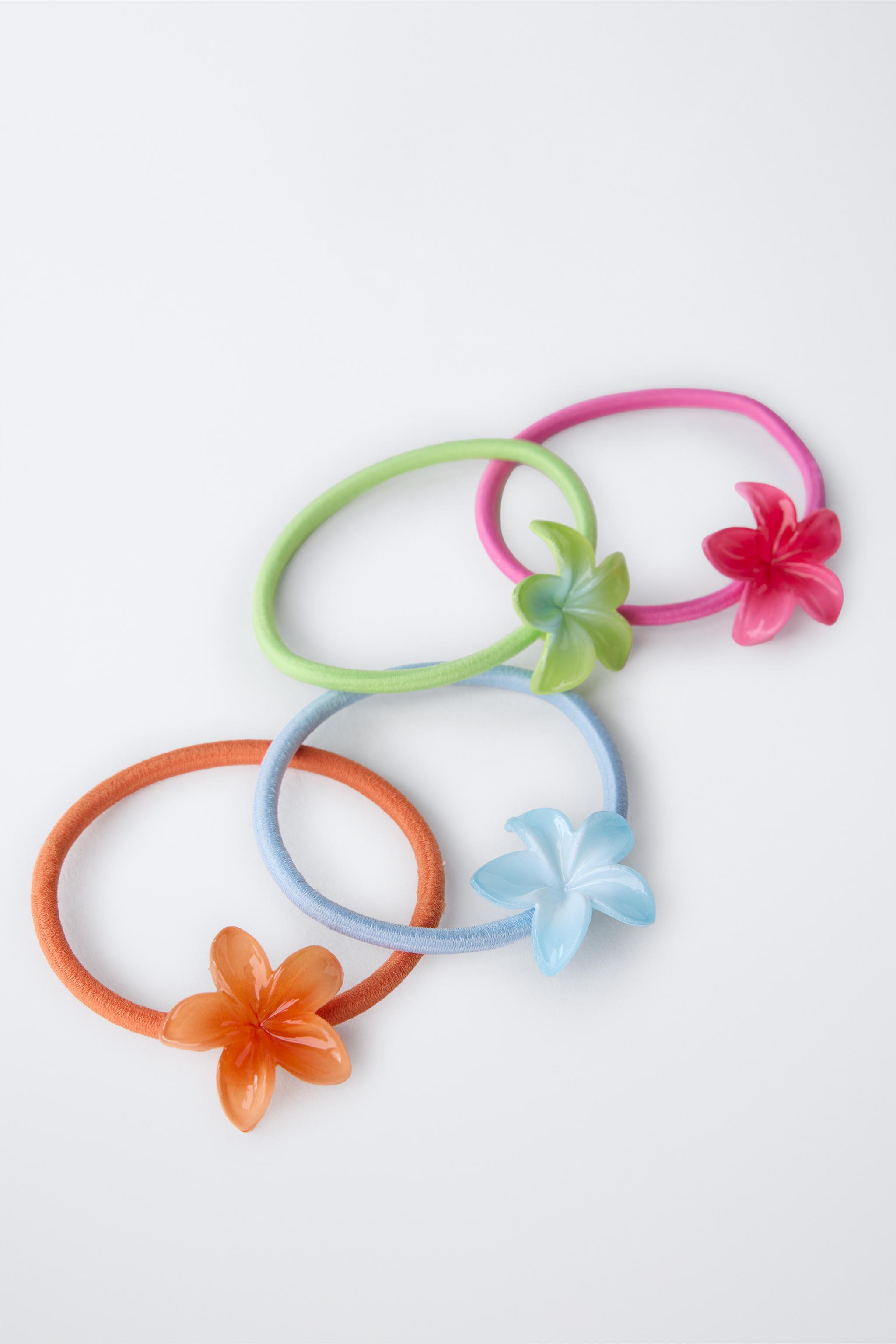 FOUR-PACK OF FLOWER HAIR TIES