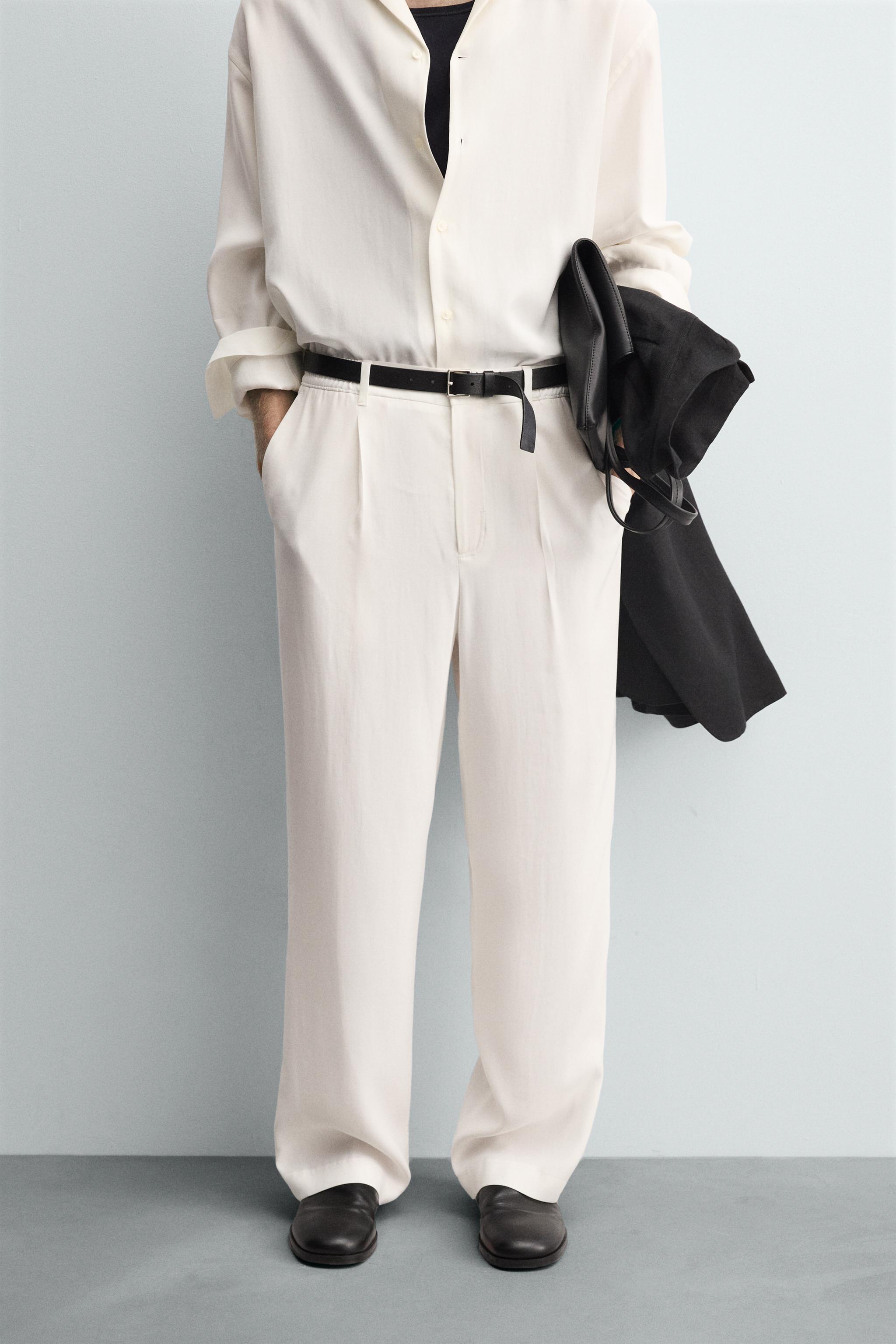 RELAXED FIT PLEATED PANTS