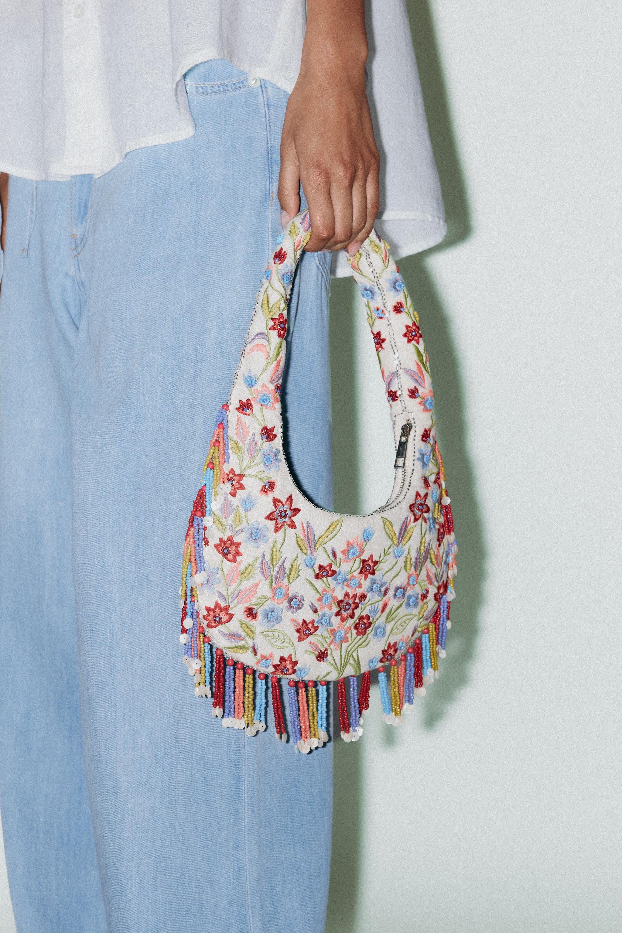 OVAL BAG WITH FLORAL EMBROIDERY