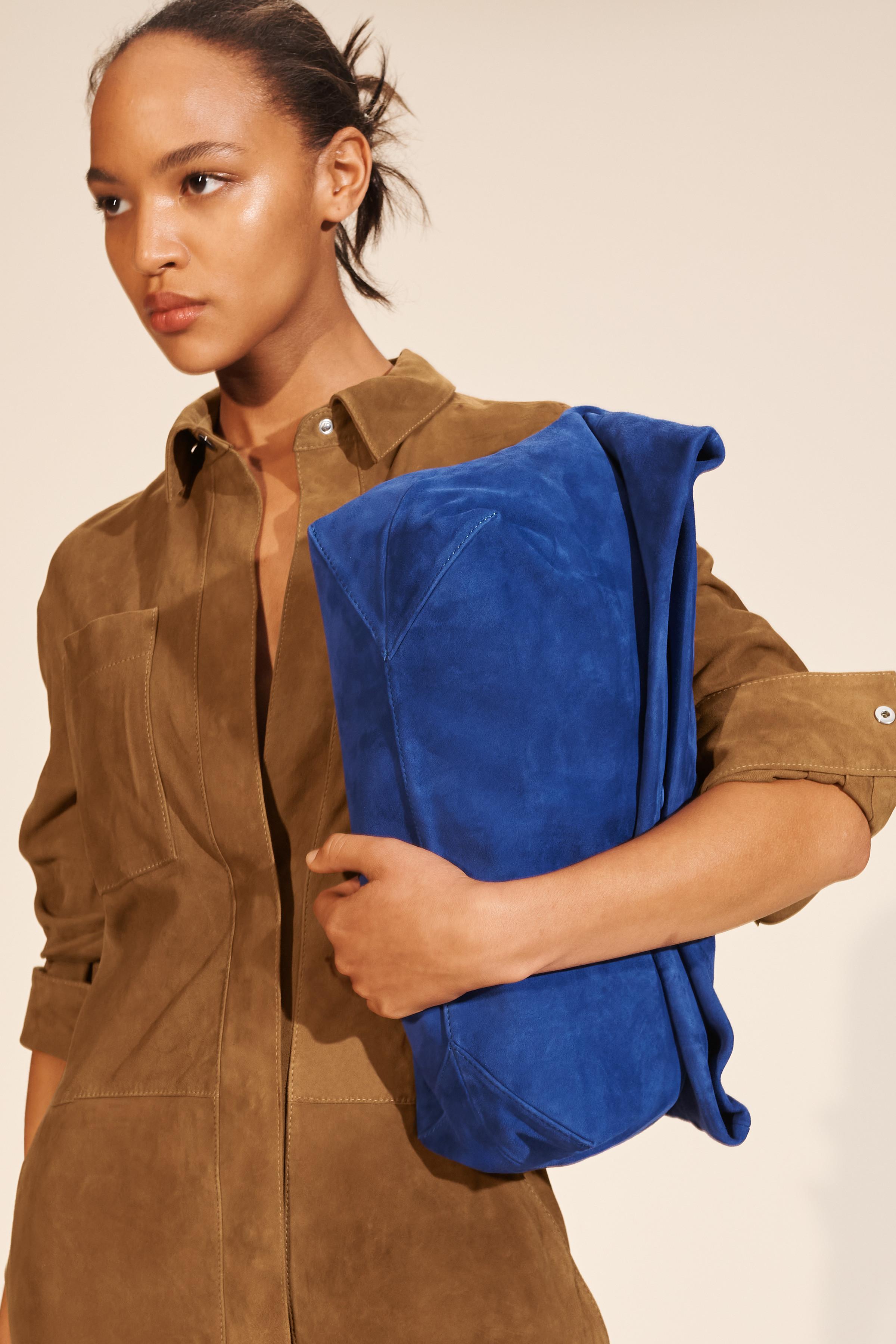 LIMITED EDITION MAXI SUEDE CLUTCH