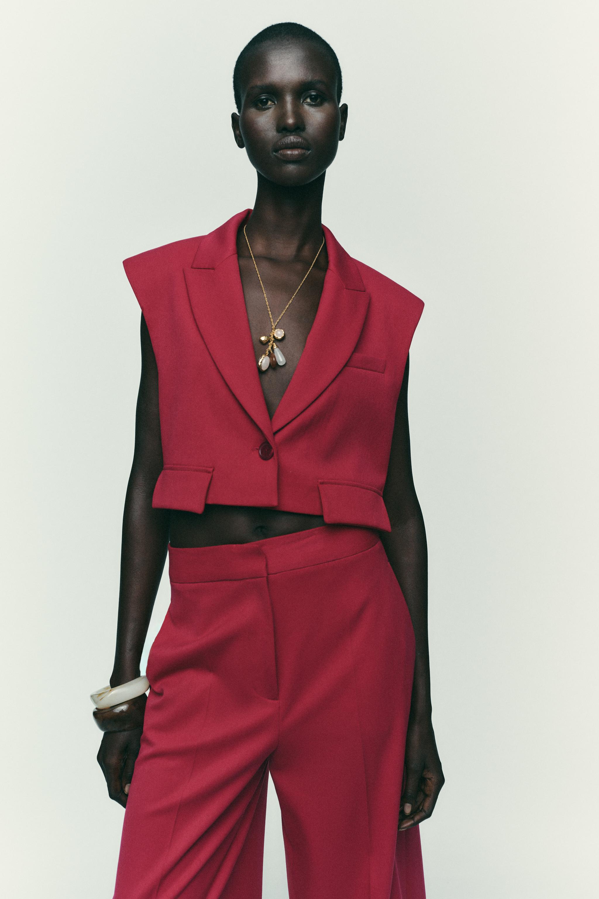 SHORT VEST WITH FLAPS