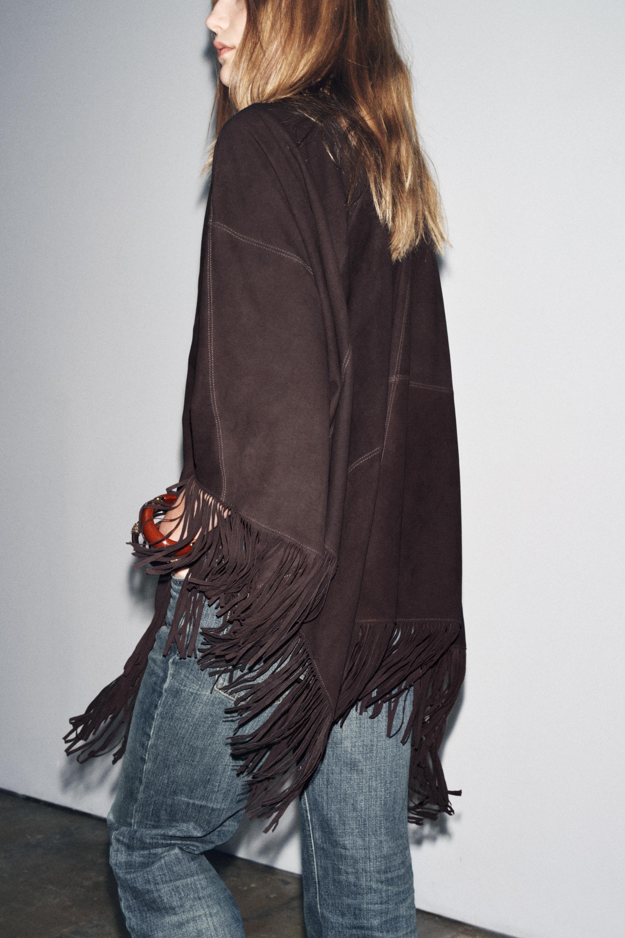 LEATHER FRINGE CAPE
