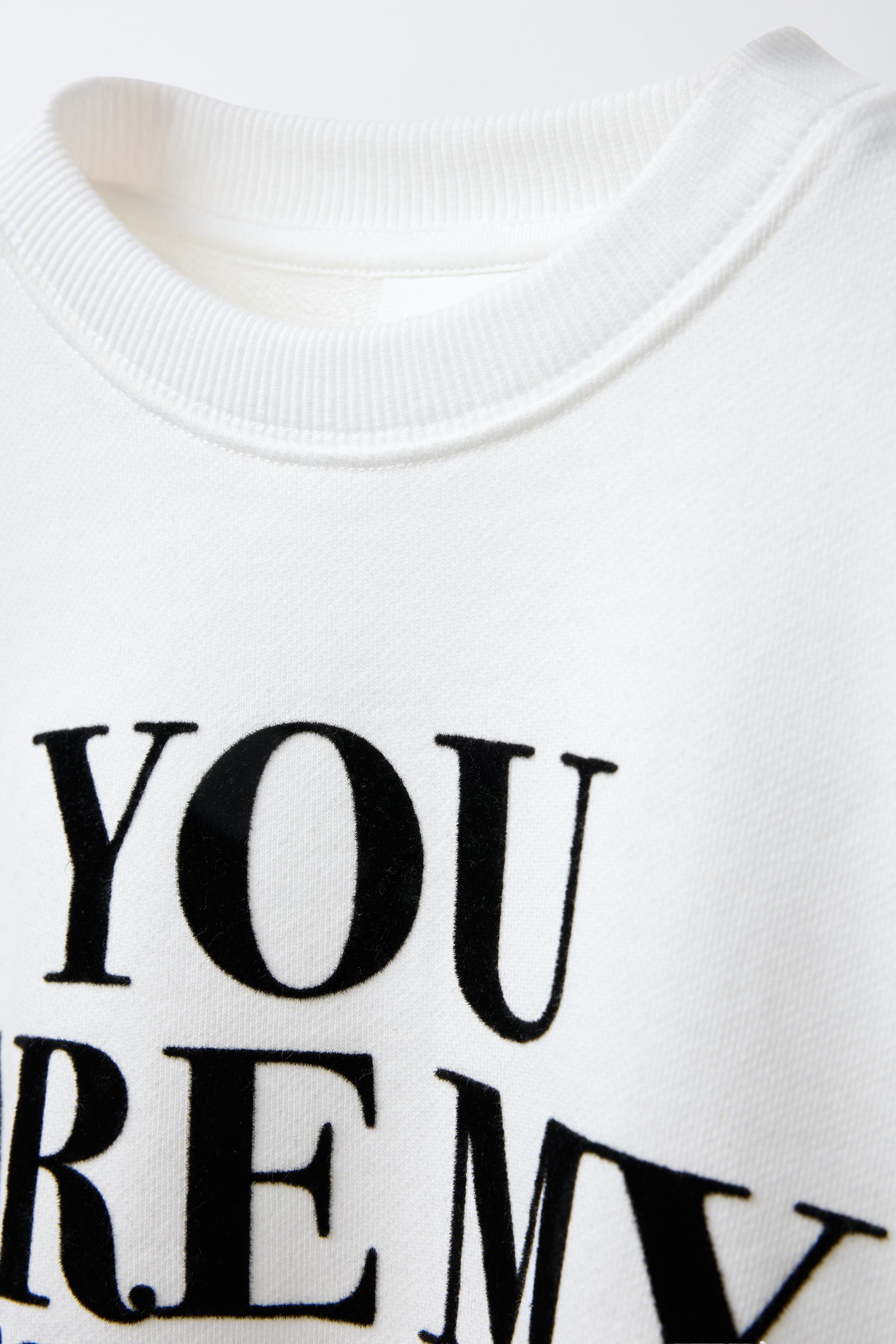 FLOCKED TEXT SWEATSHIRT