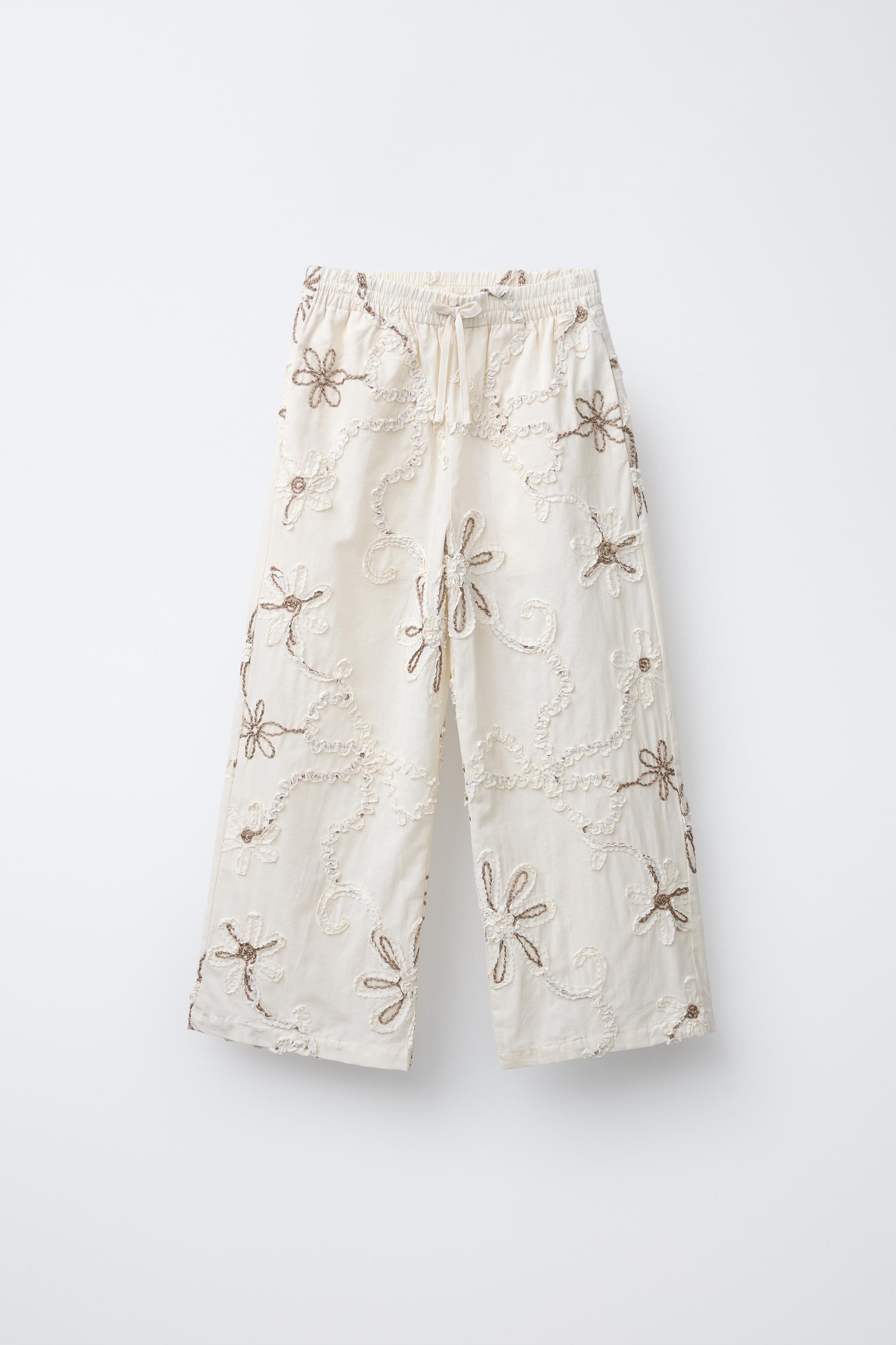 STRAIGHT LEG PANTS WITH EMBROIDERED FLOWERS