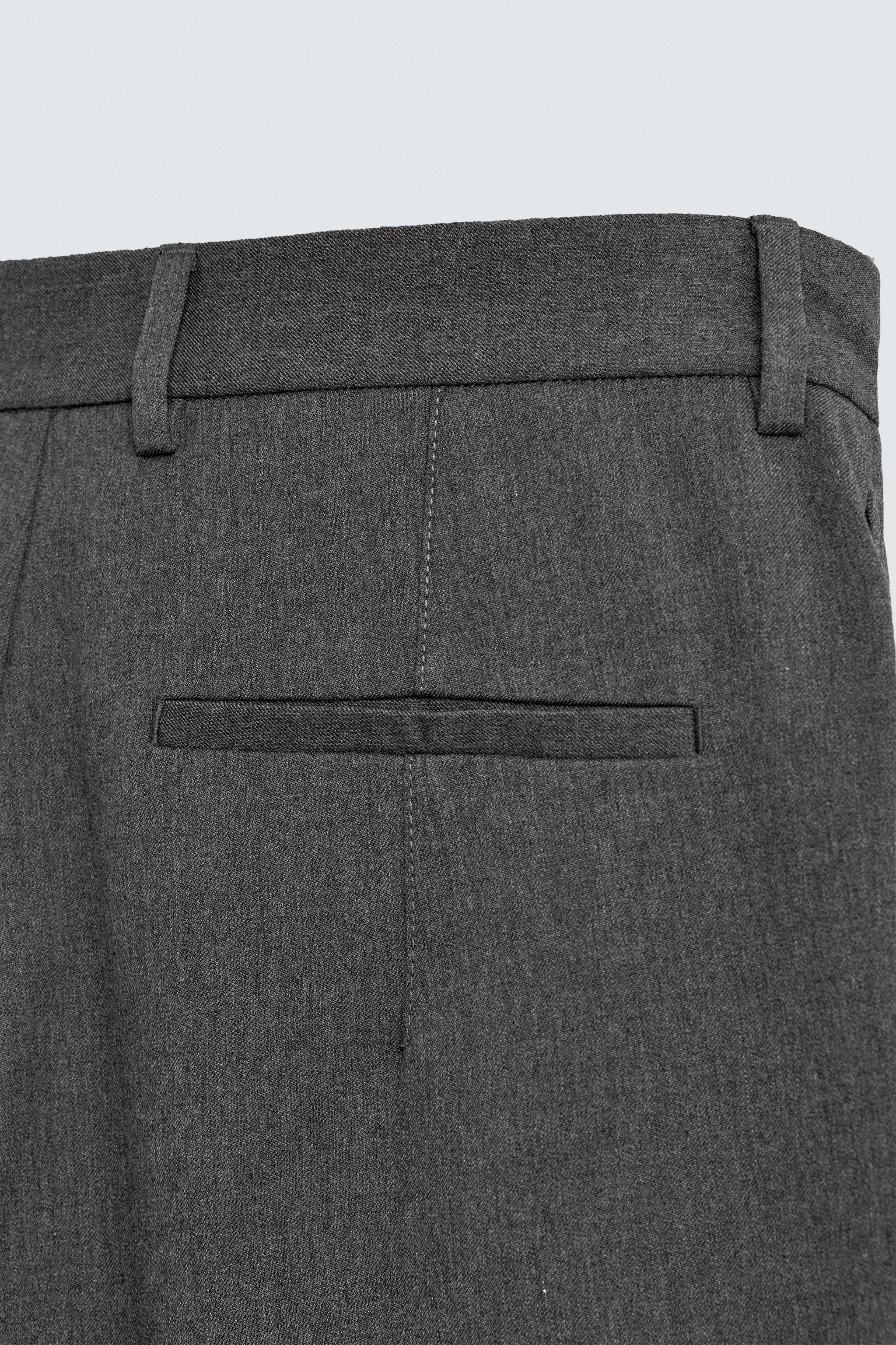 PLEATED WIDE FIT PANTS