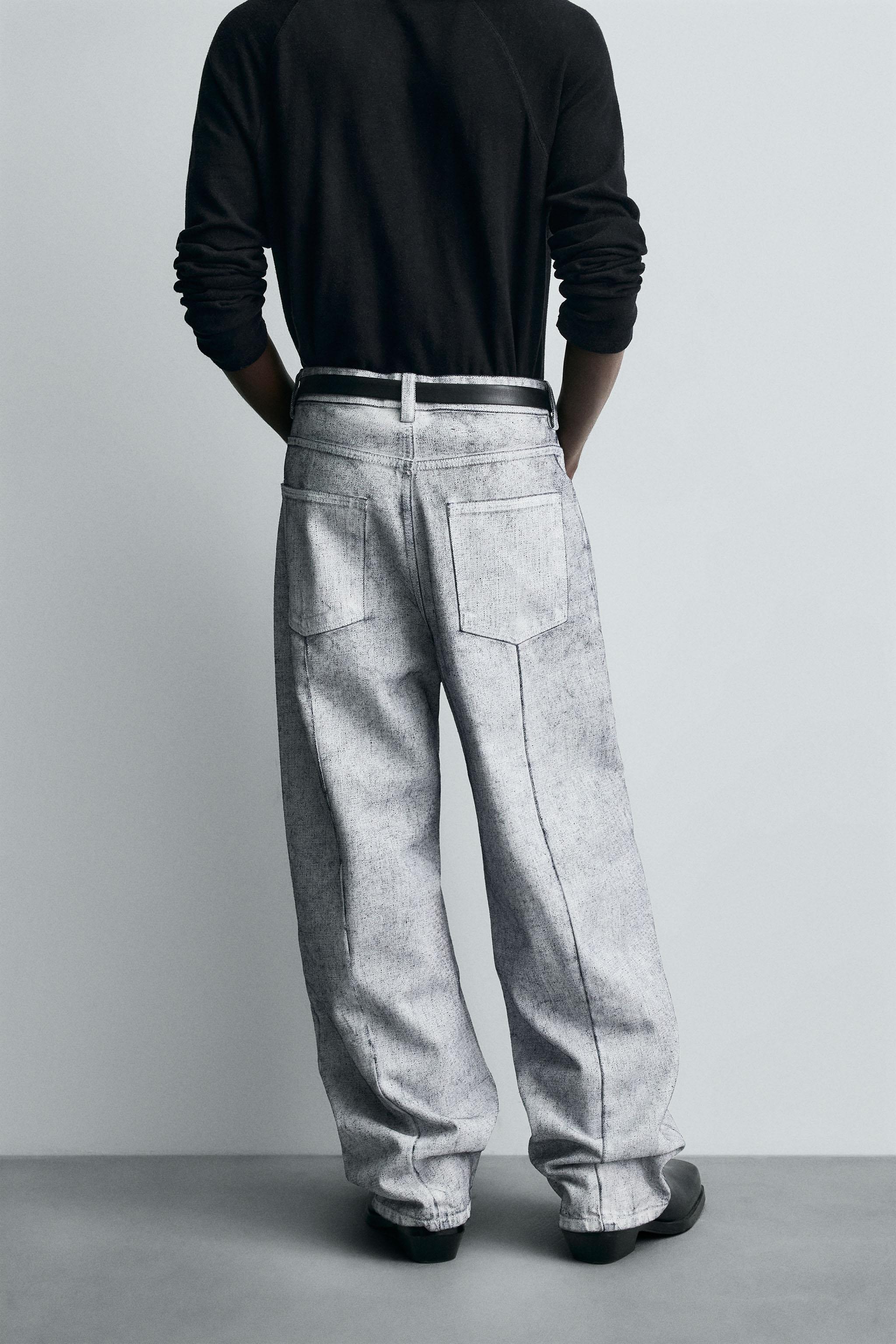 WAXED FINISH BAGGY FIT JEANS