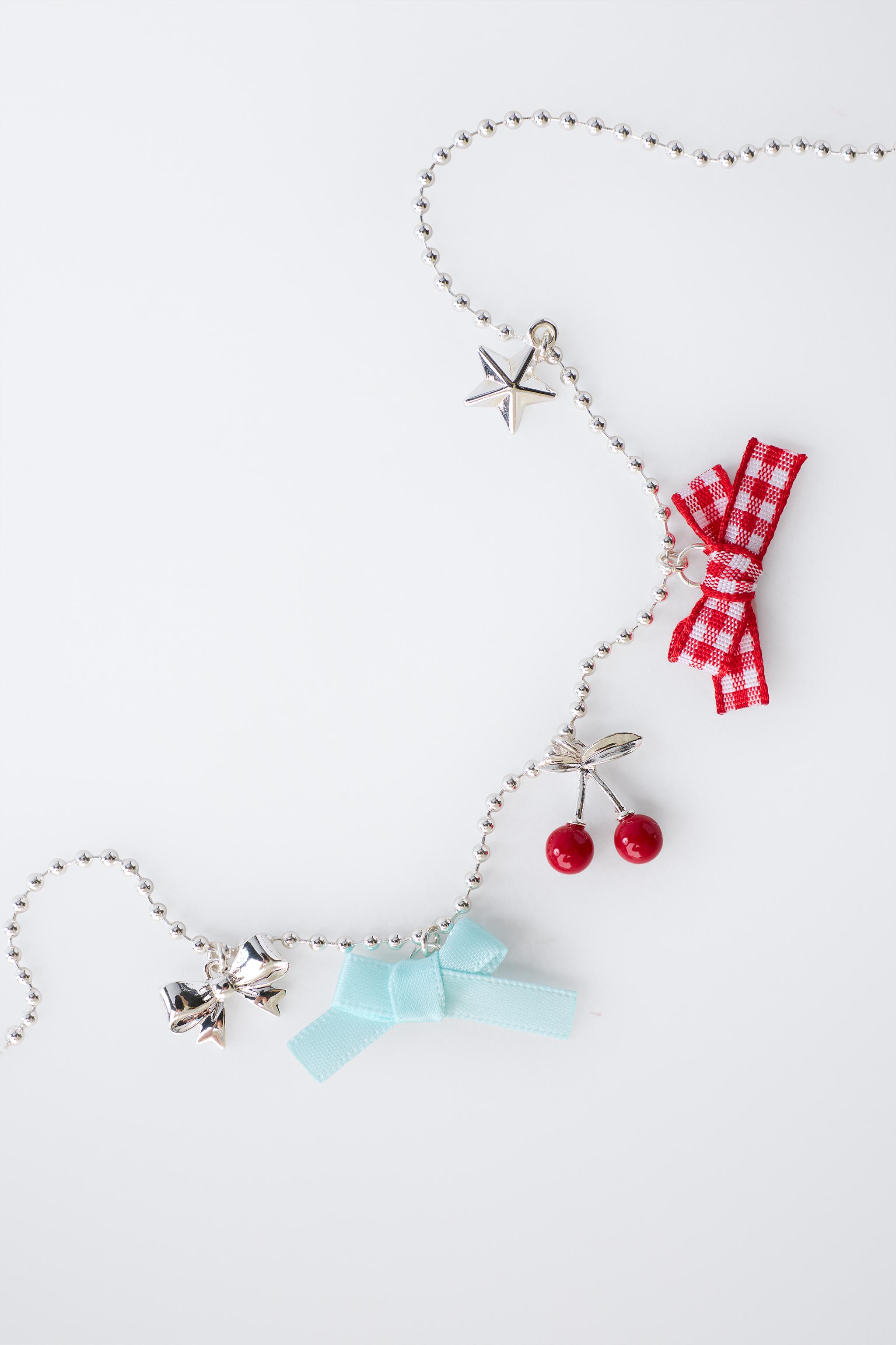CHERRY AND BOW NECKLACE