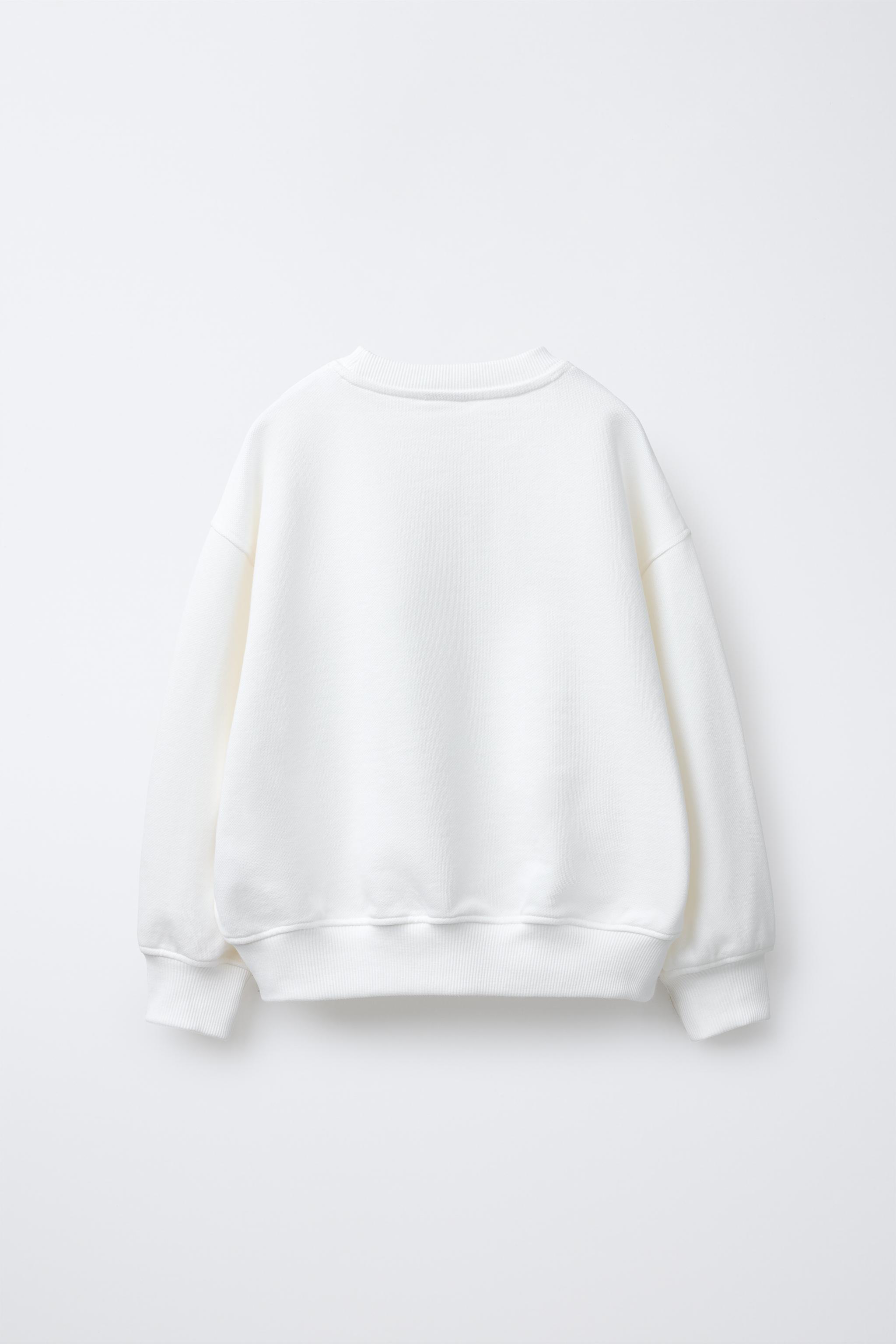 FLOCKED TEXT SWEATSHIRT