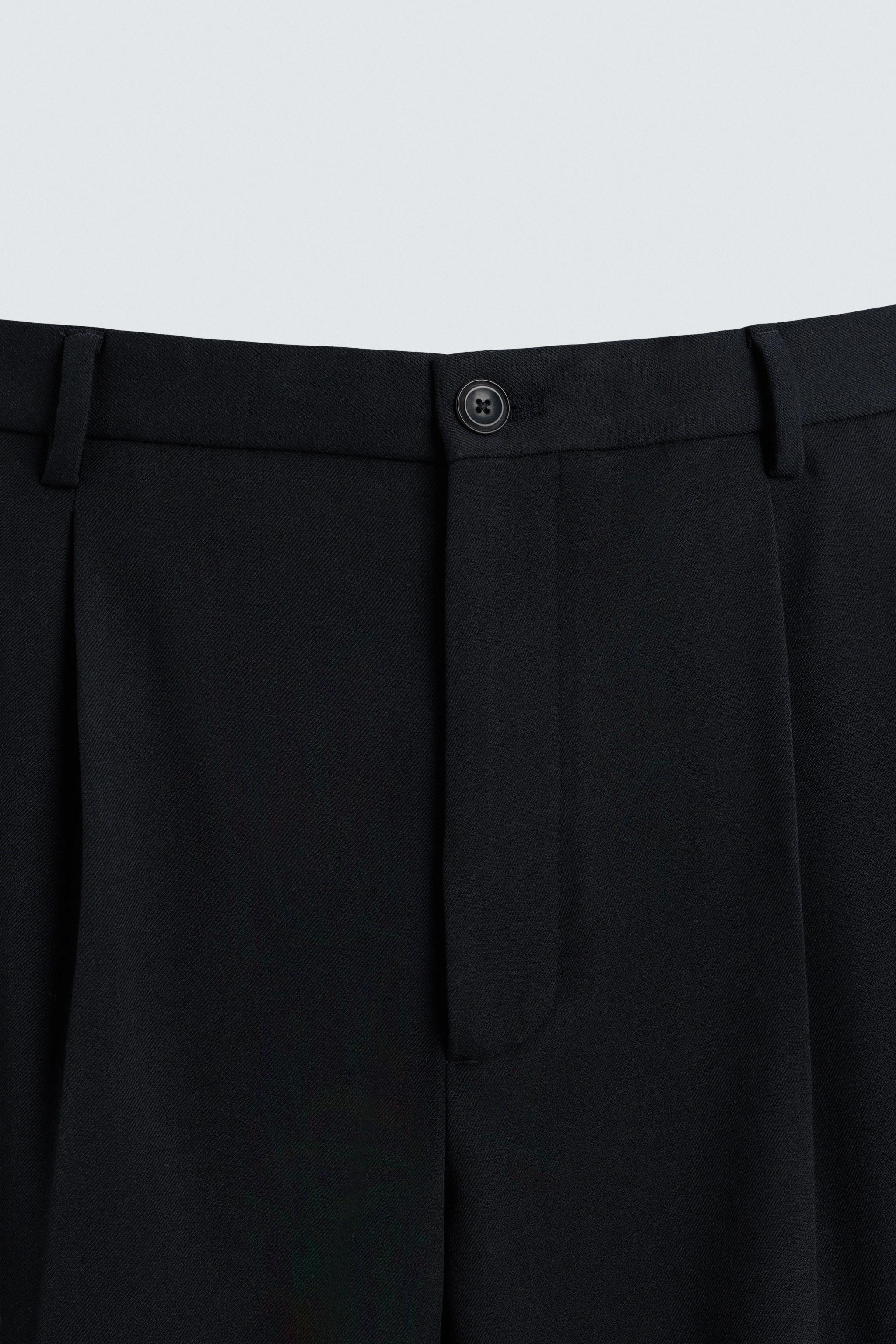 REGULAR FIT PLEATED PANTS