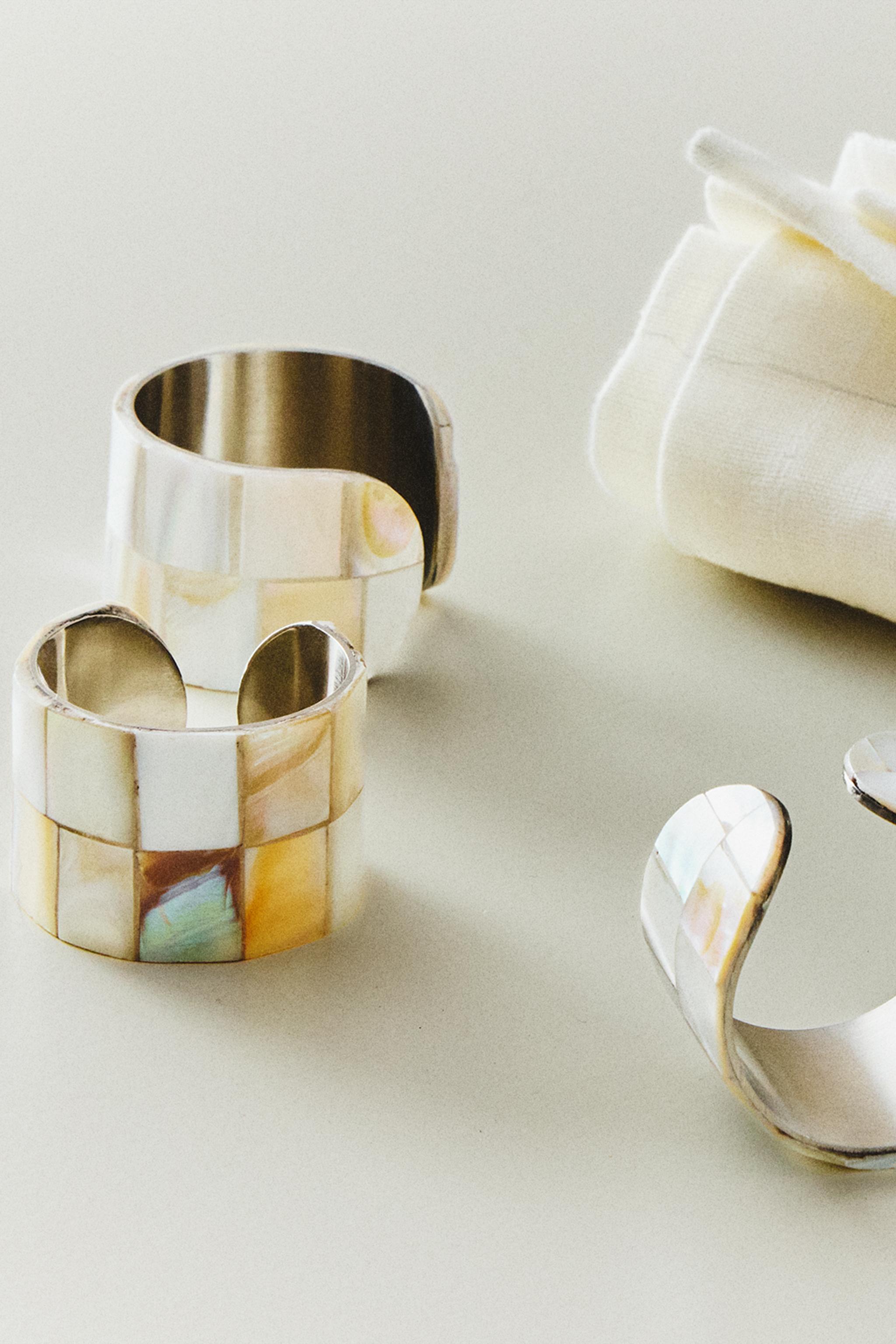 SET OF MOTHER-OF-PEARL NAPKIN RINGS (SET OF 4)