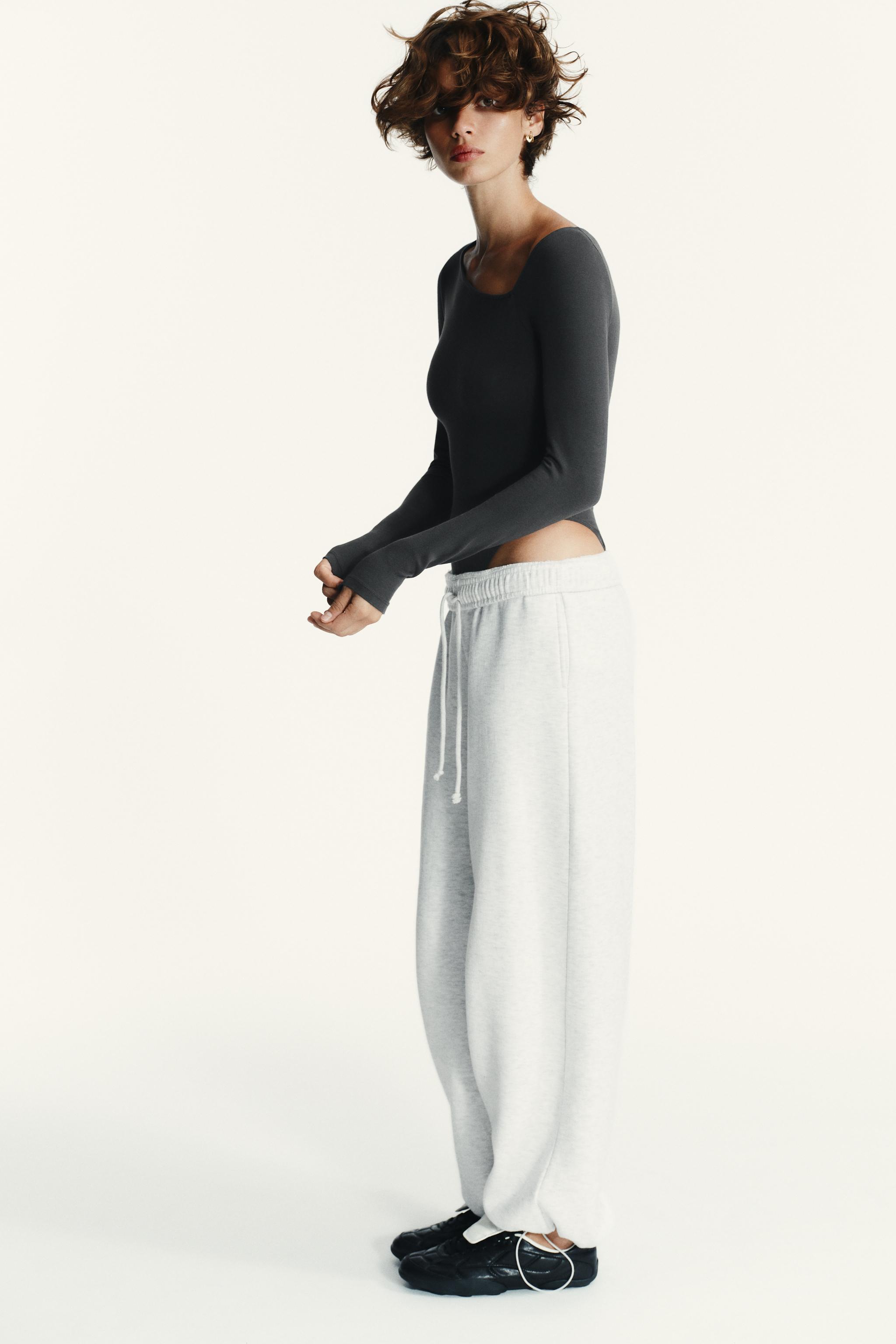 ASYMMETRIC LONG SLEEVE BODYSUIT