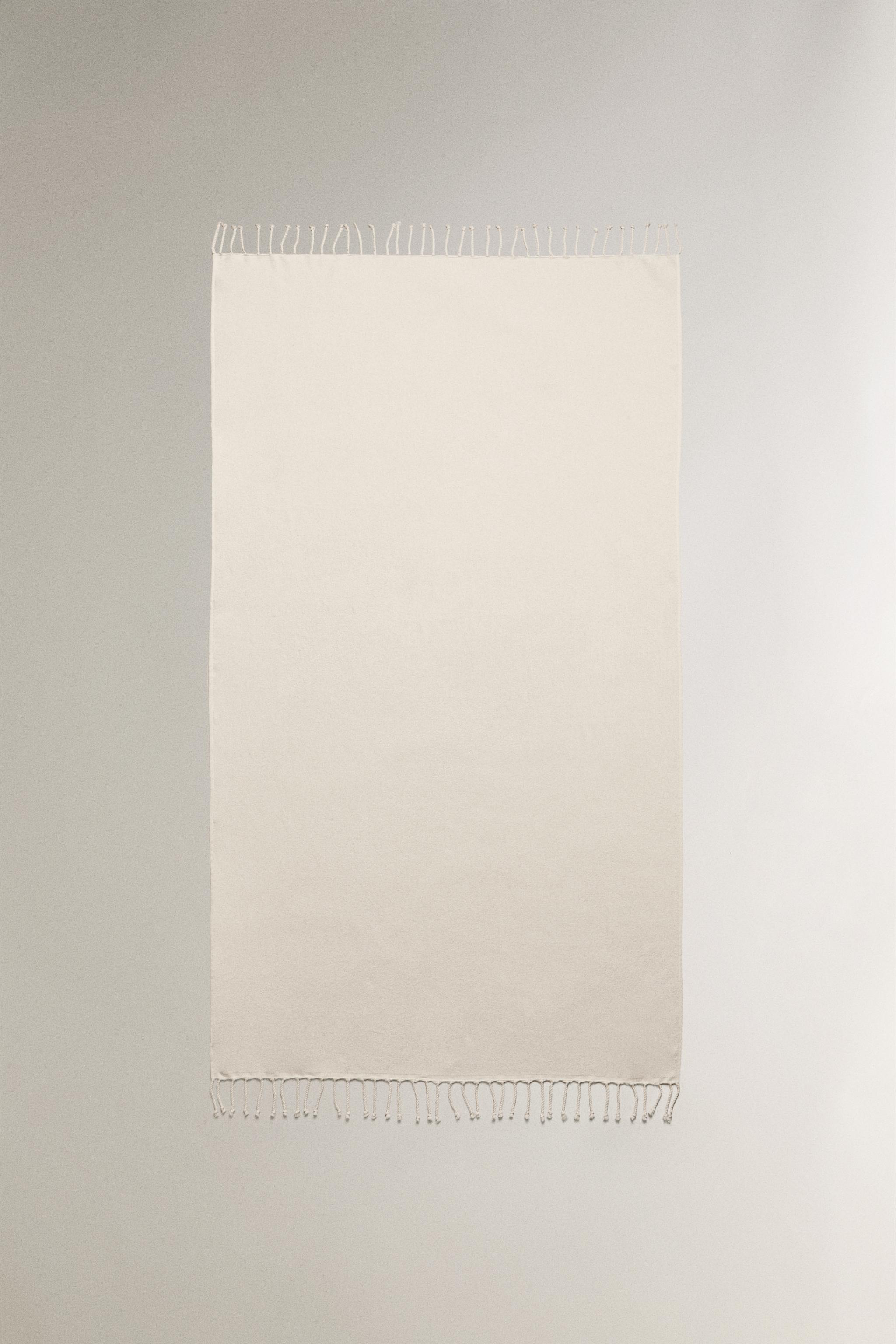 FRINGED COTTON BEACH TOWEL