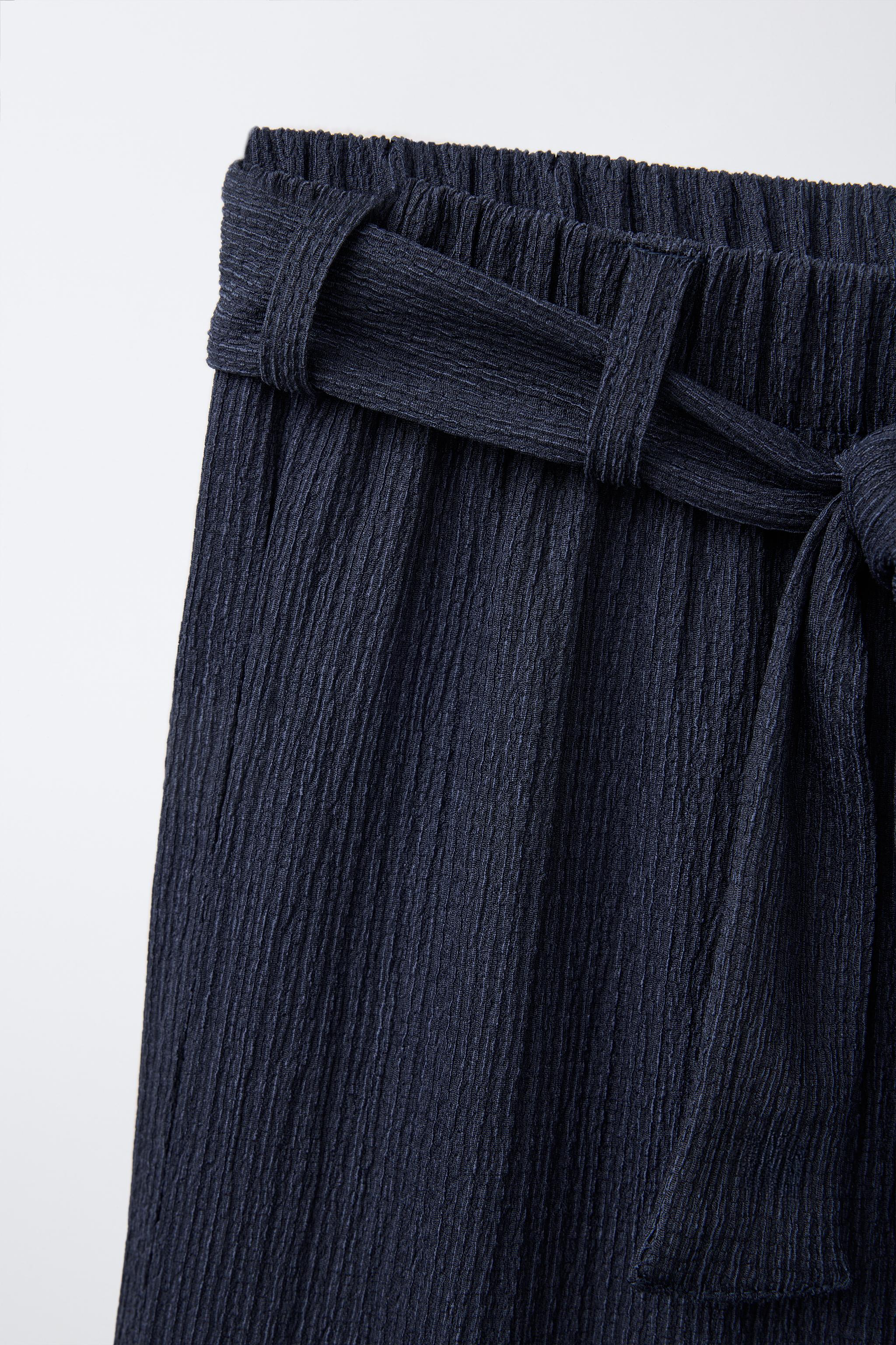 TEXTURED WIDE LEG BELTED PANTS