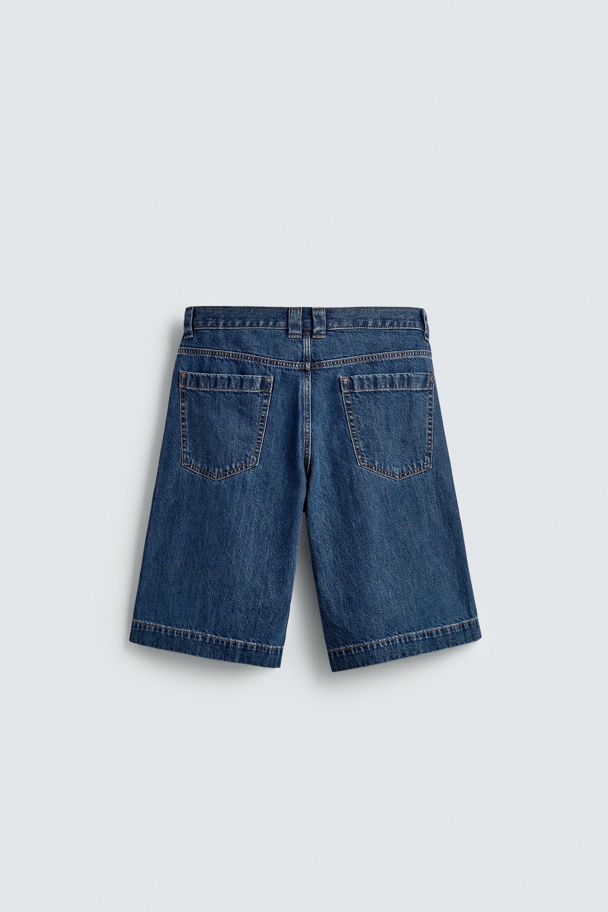 PLEATED RELAXED FIT DENIM SHORTS
